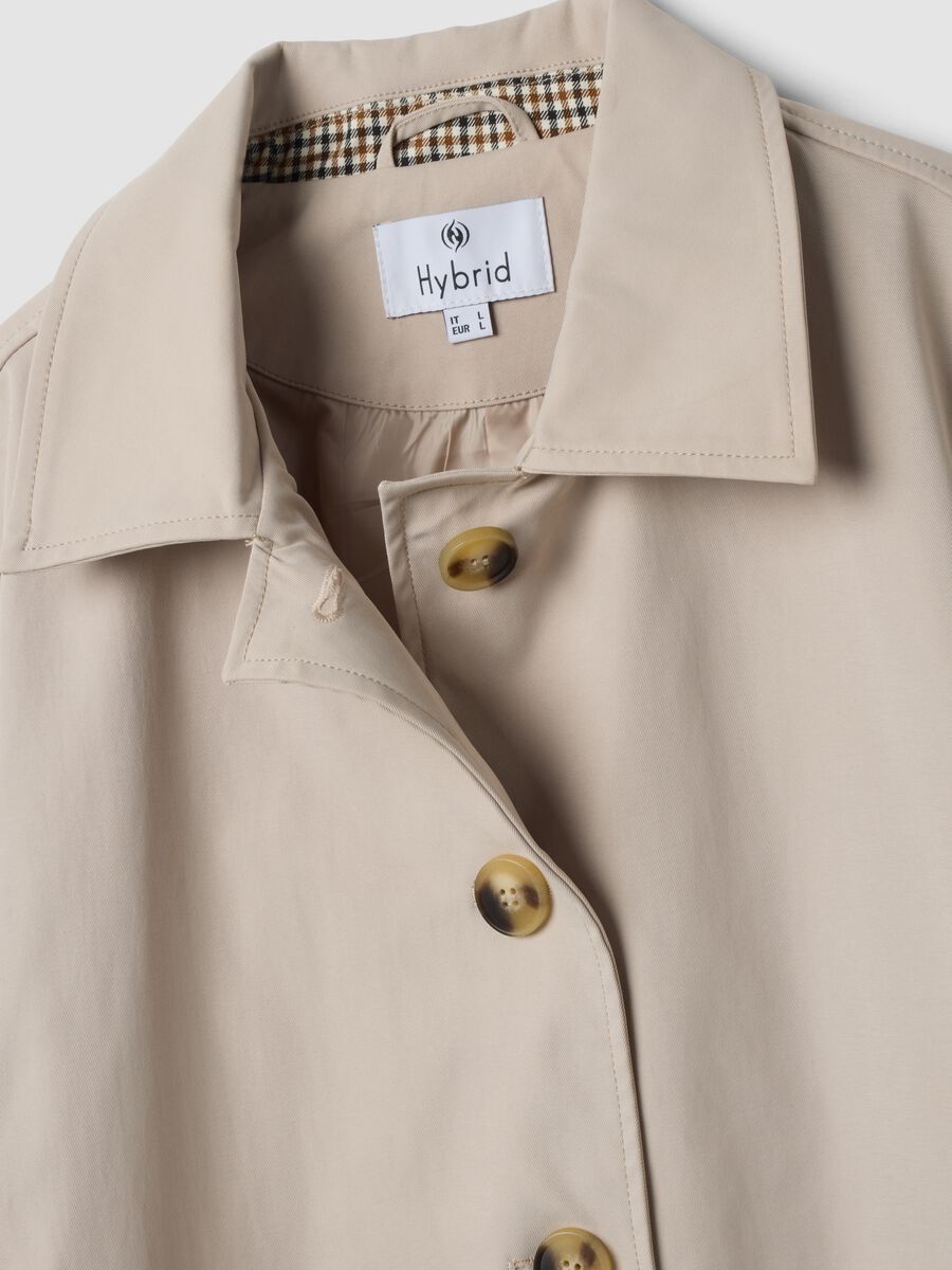 Beige regular-fit parka with buttons and slanted pockets_1