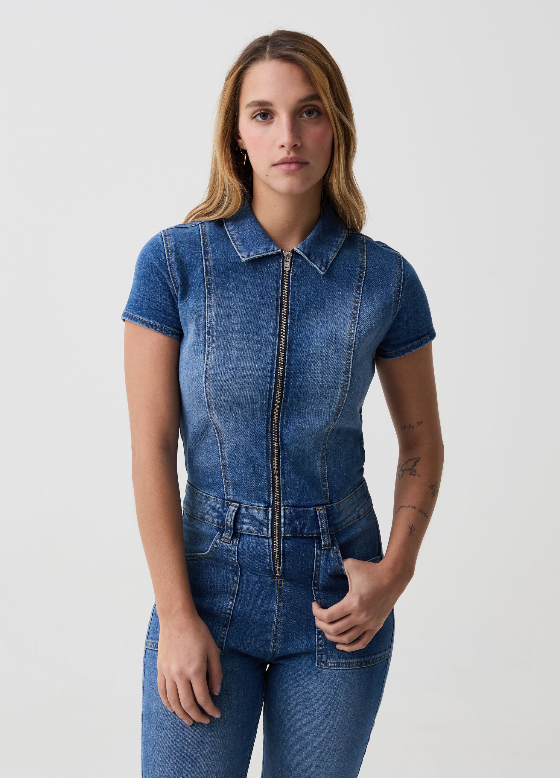 Tuta intera in denim con zip