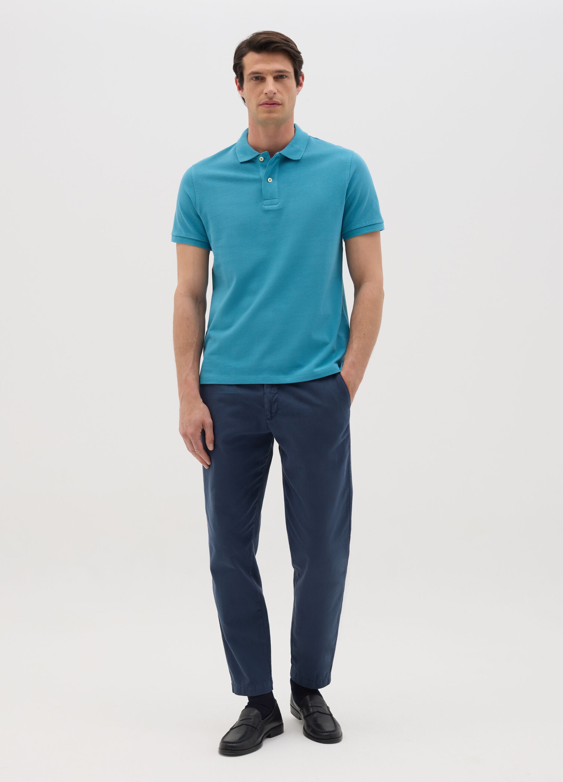 Men’s light blue polo shirt in 100% cotton with regular fit