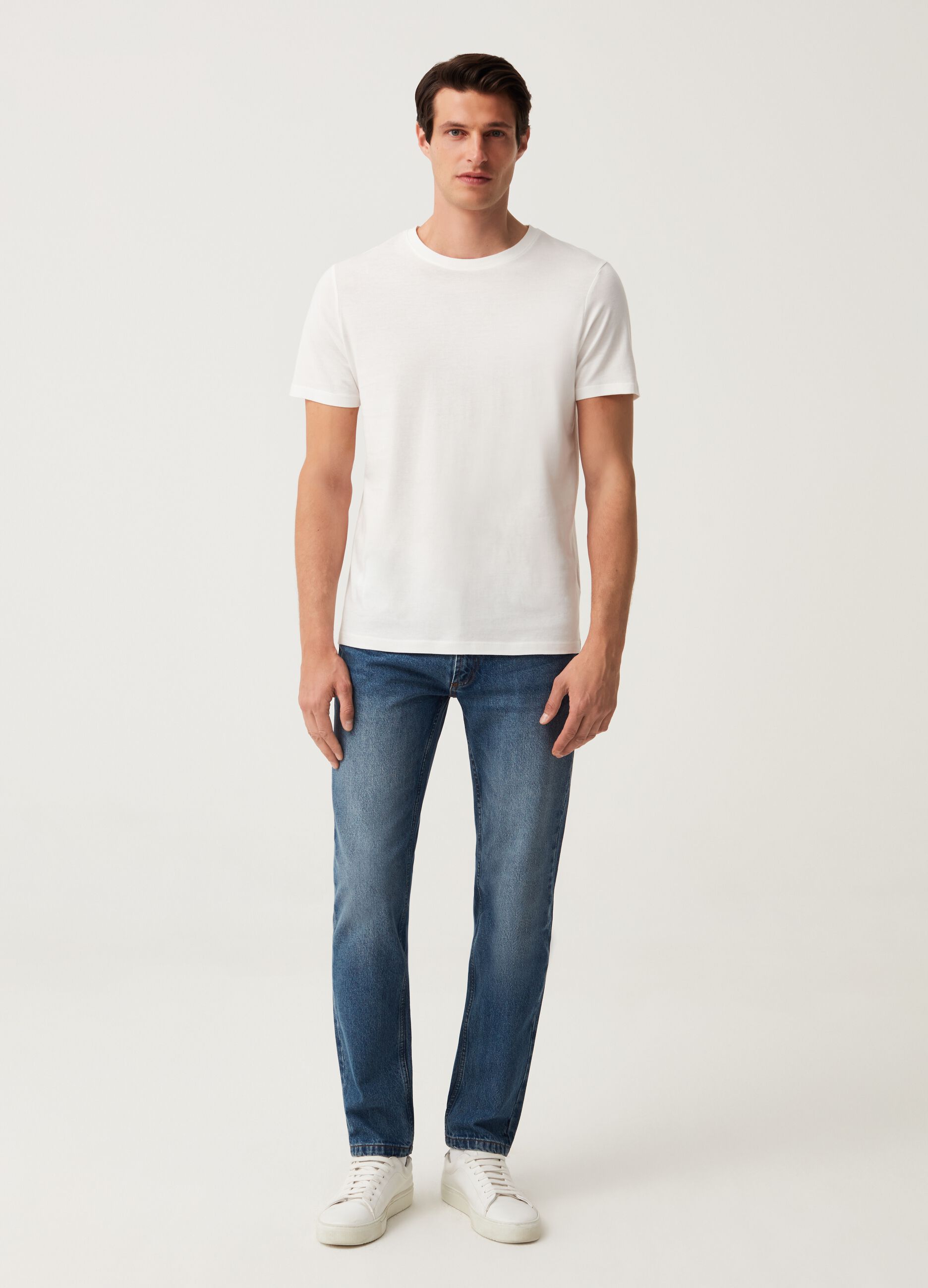 Jeans slim fit con scoloriture_0
