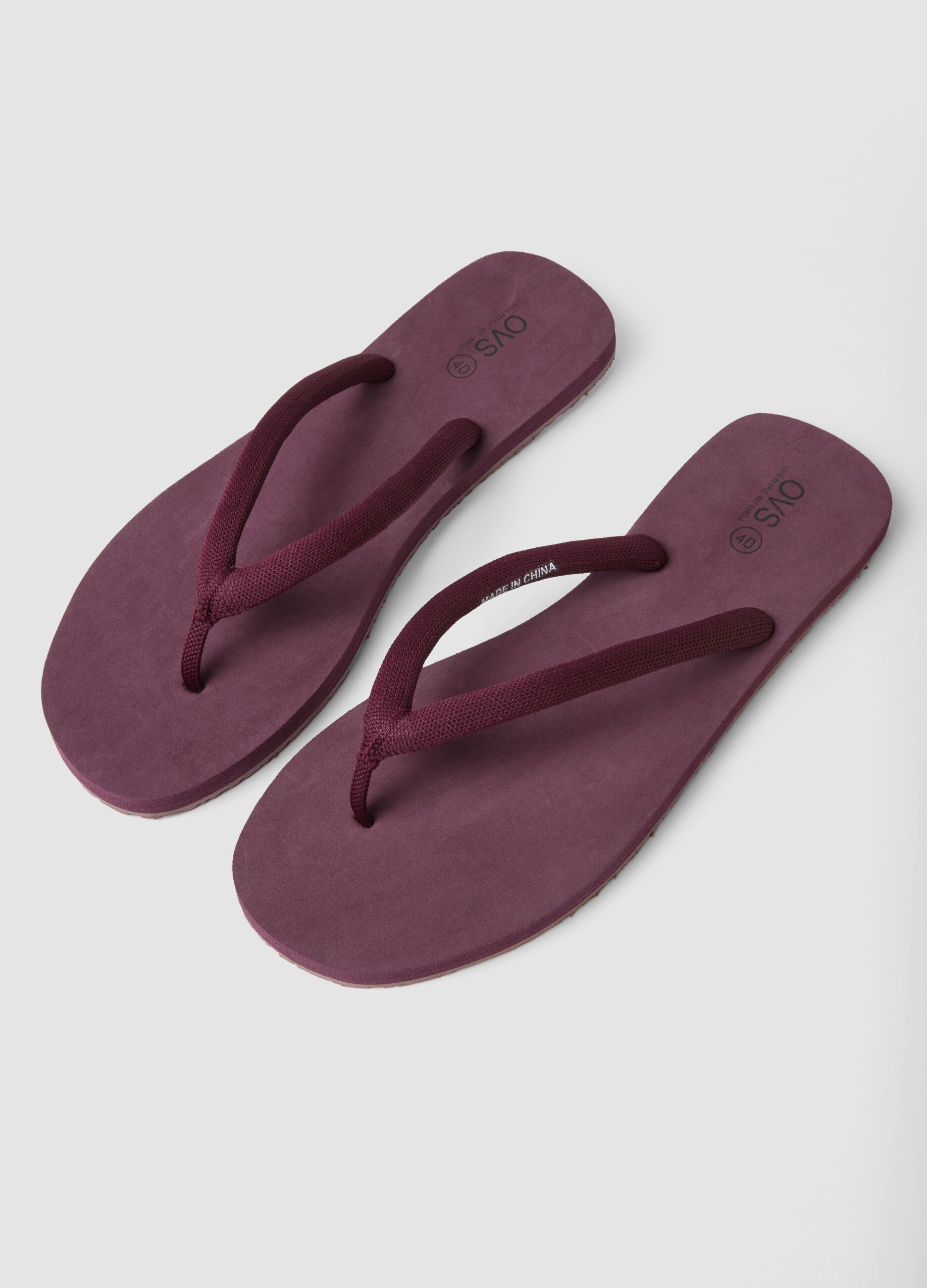 Purple flip-flops with thick straps