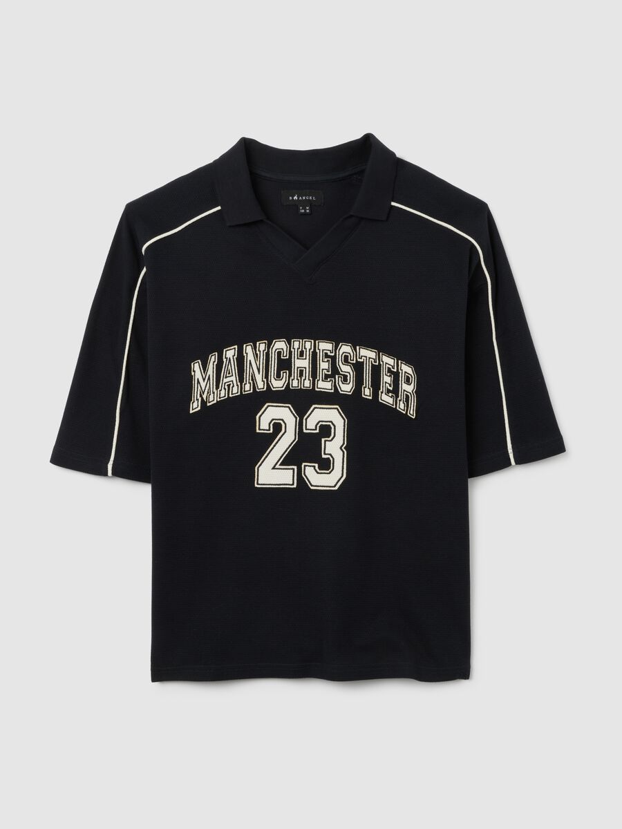 Polo sportiva in puro cotone nero vestibilità oversize_4