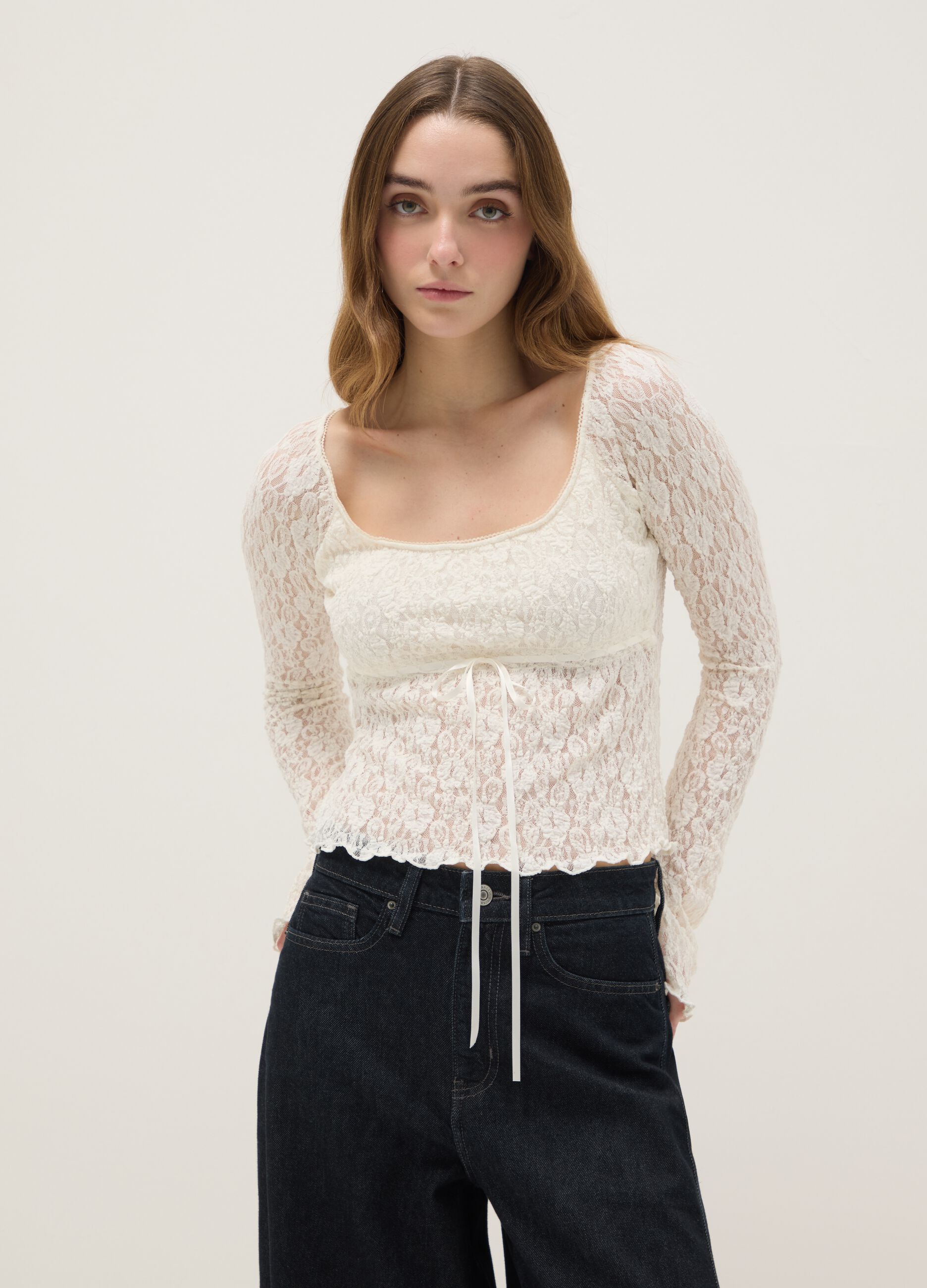 White long-sleeve top with lace