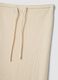 Beige long skirt in stretchy textured fabric_5