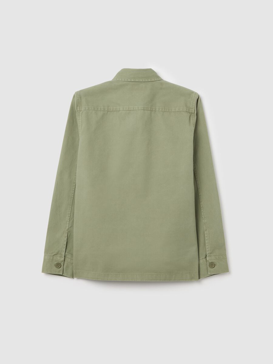 Boys’ shirt in 100% green cotton with oversized fit and button fastening_1