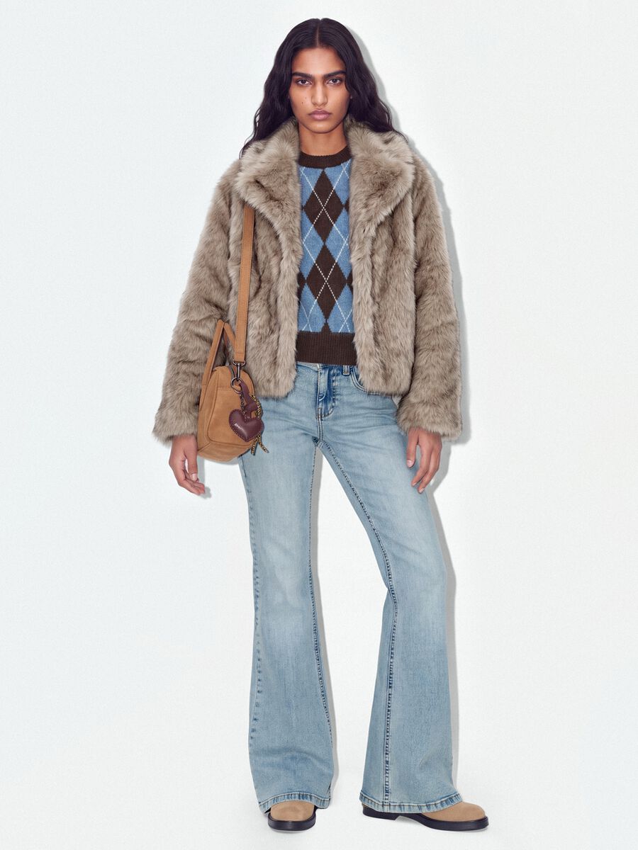 Jeans blu chiaro flare in cotone elasticizzato_1
