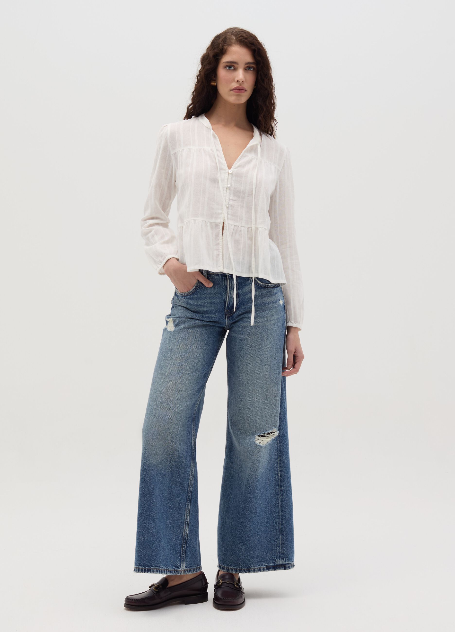 Blouse with laces and striped motif