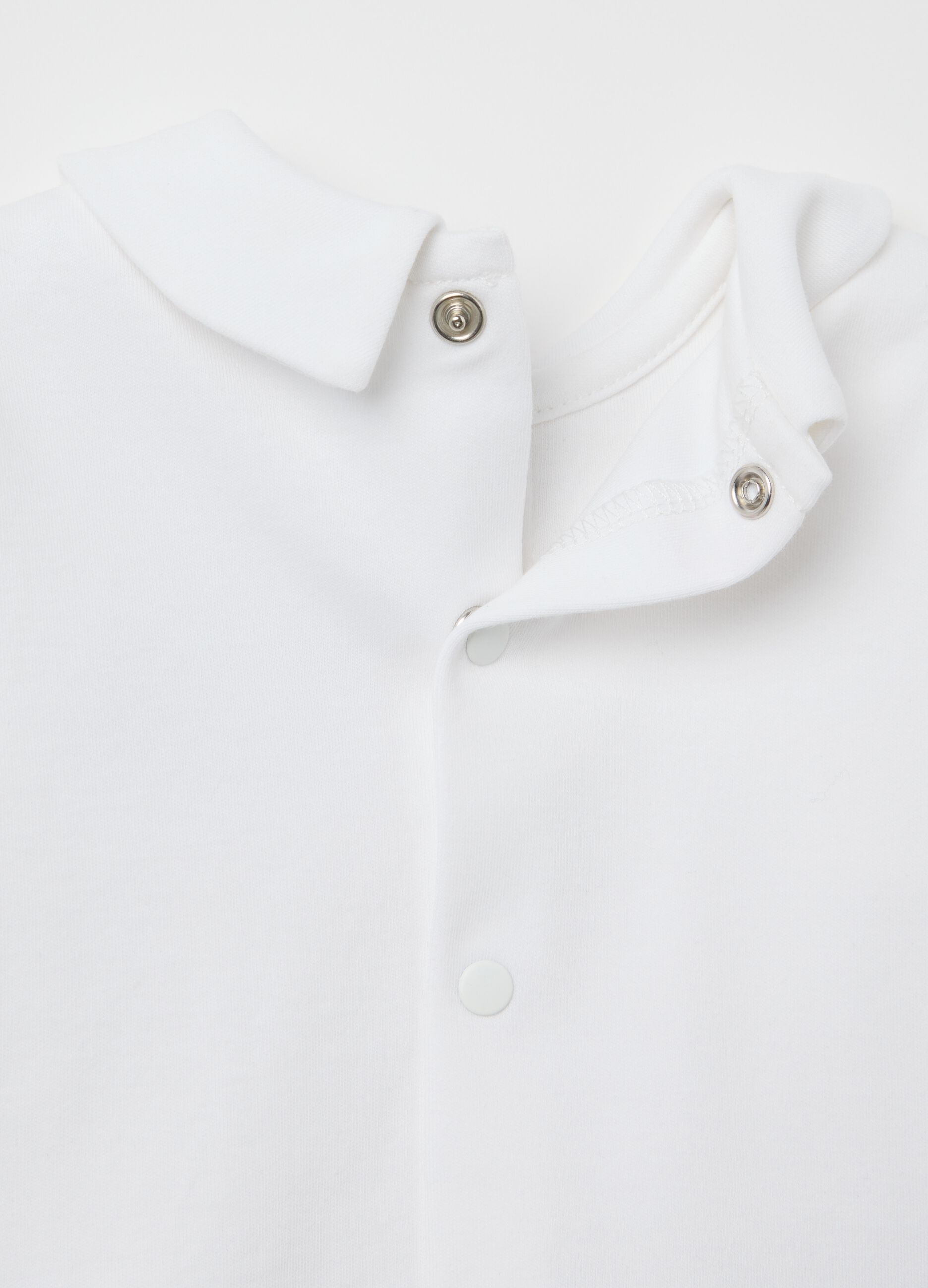 Blue two-tone cotton onesie with fish embroidery