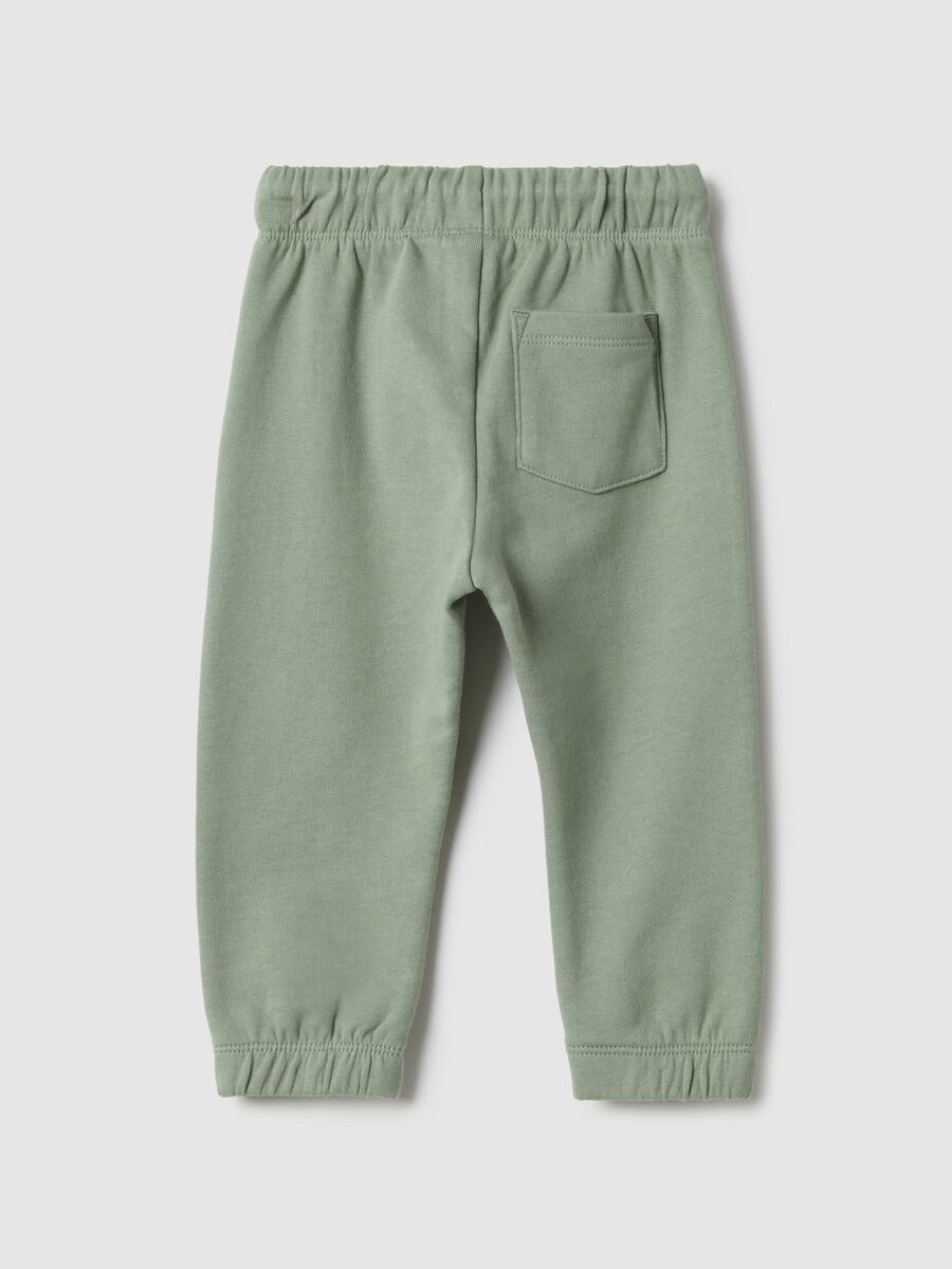 Kids' regular fit green jogger trousers in pure cotton_1