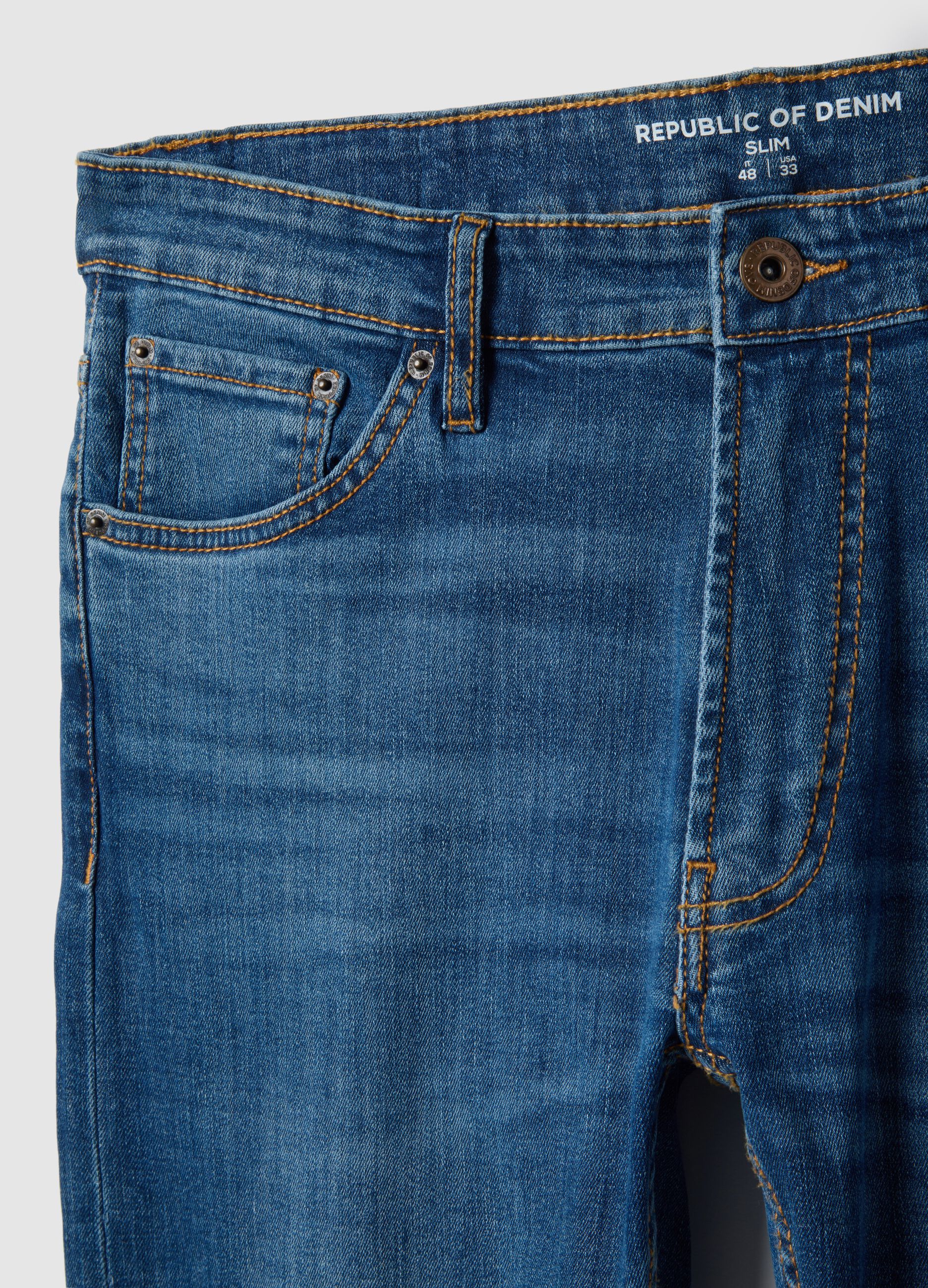 Slim fit blue stretch cotton jeans with five pockets