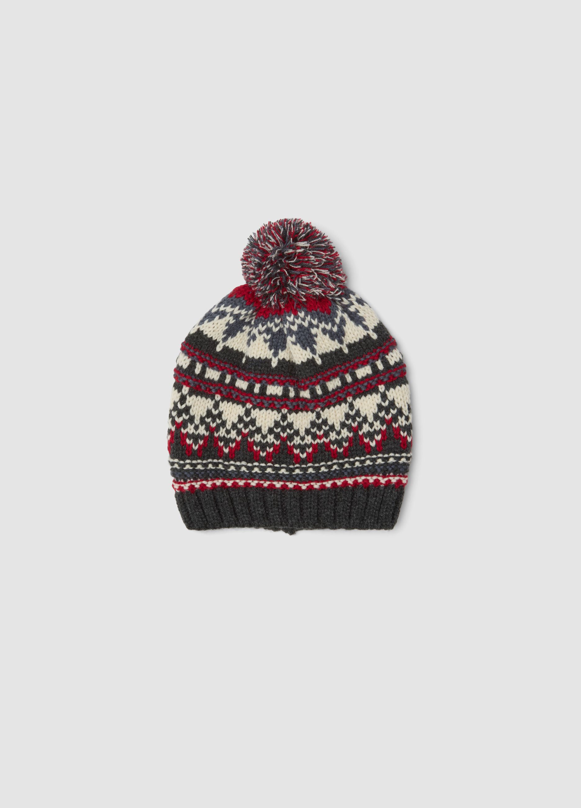 Berretto con fantasia jacquard e pon pon