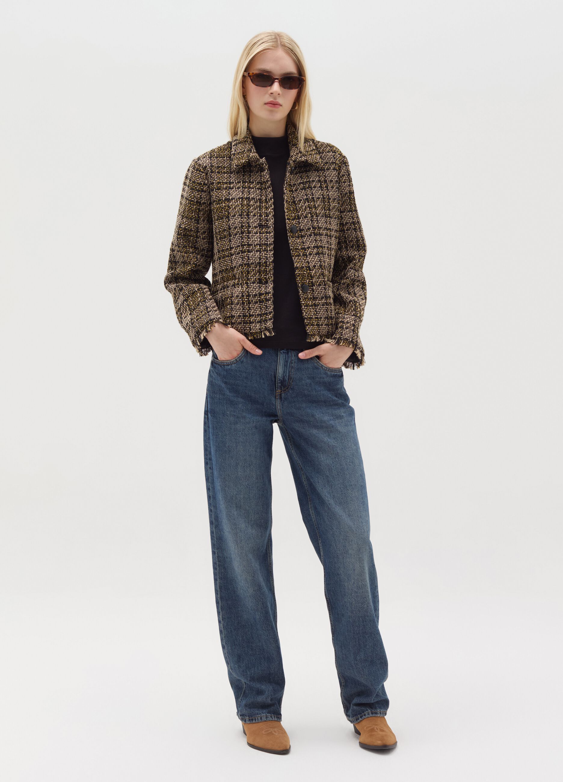 Short jacket in check tweed with fringing