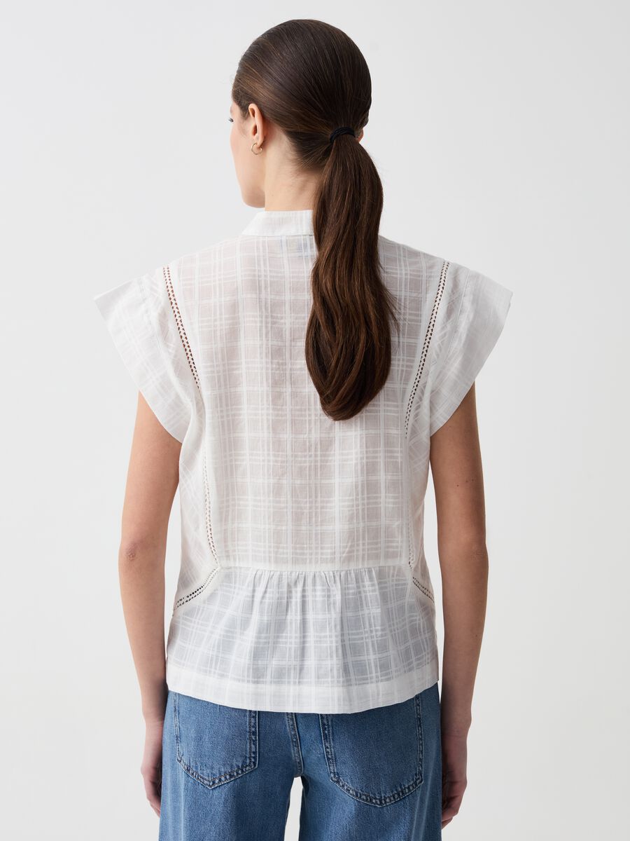 Blouse with check design and à jour embroidery_2