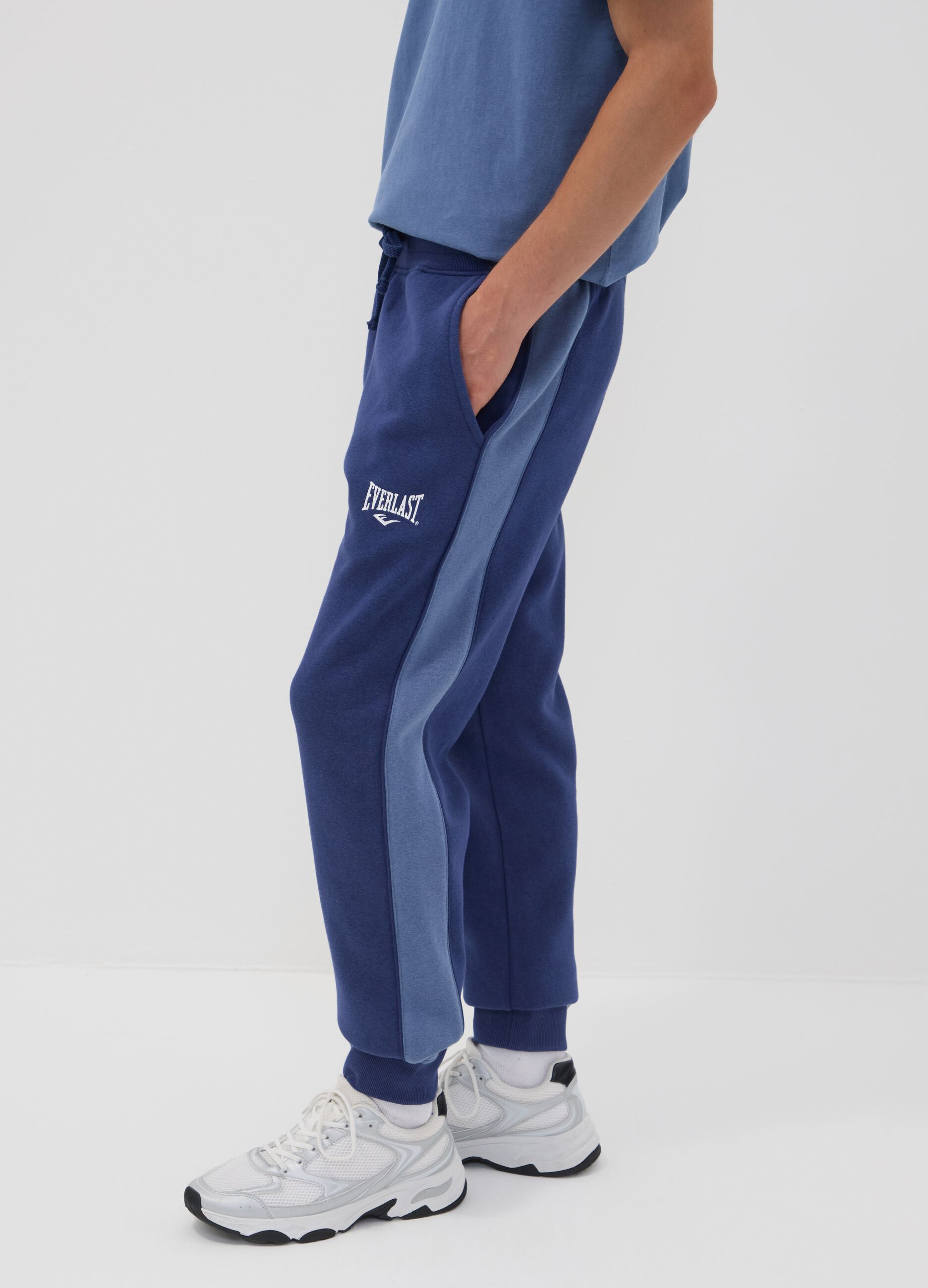 Blue cotton-blend joggers with print