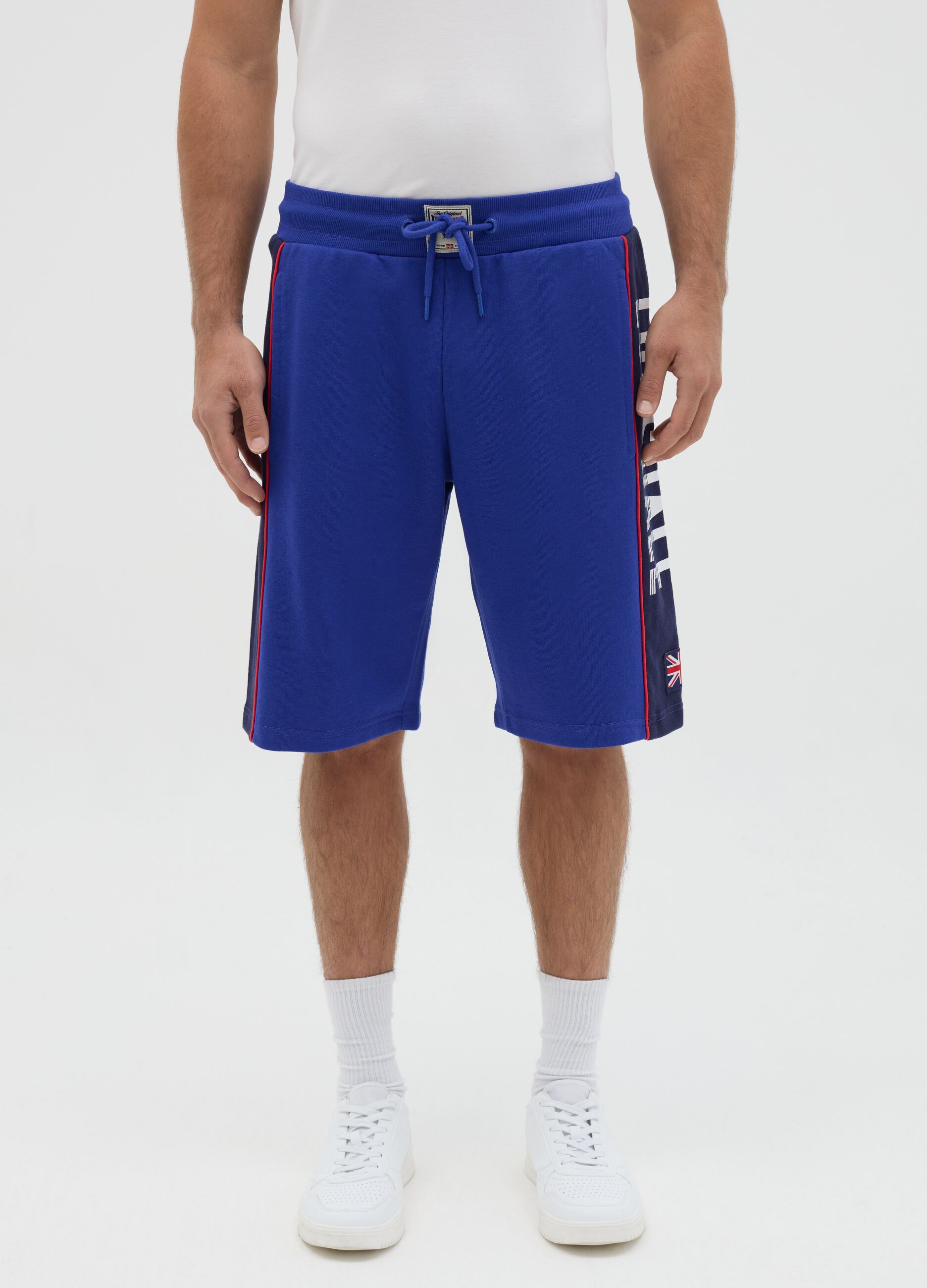 Blue sports Bermuda shorts with logo