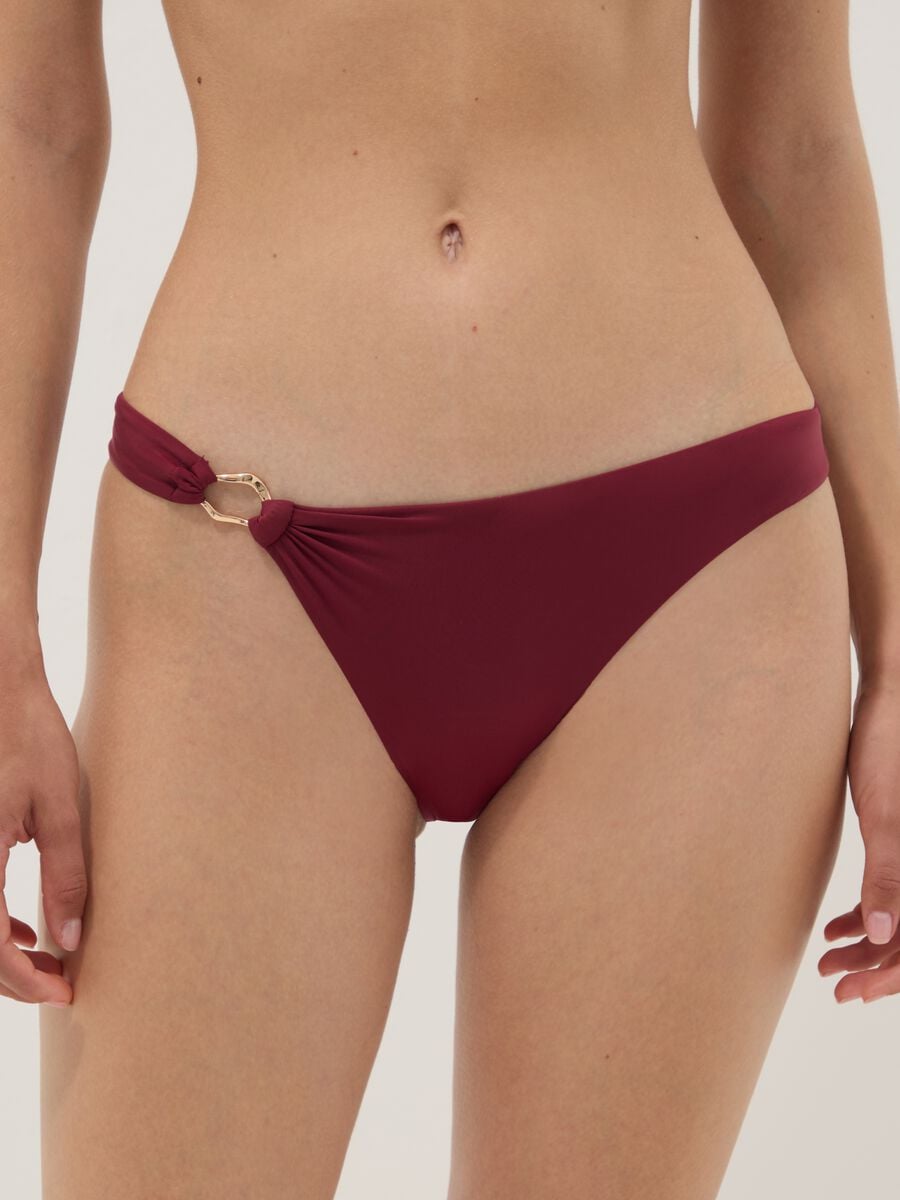 Red stretch bikini bottoms with gold-tone ring detail_1