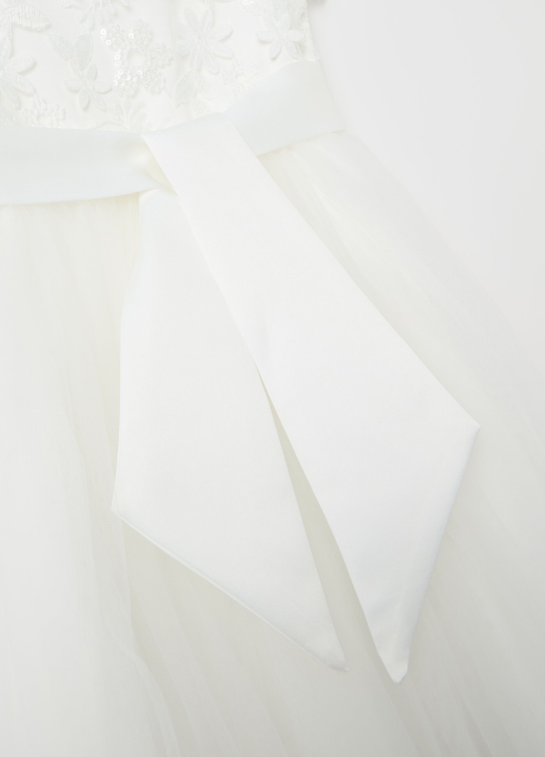 Tulle dress with floral applications