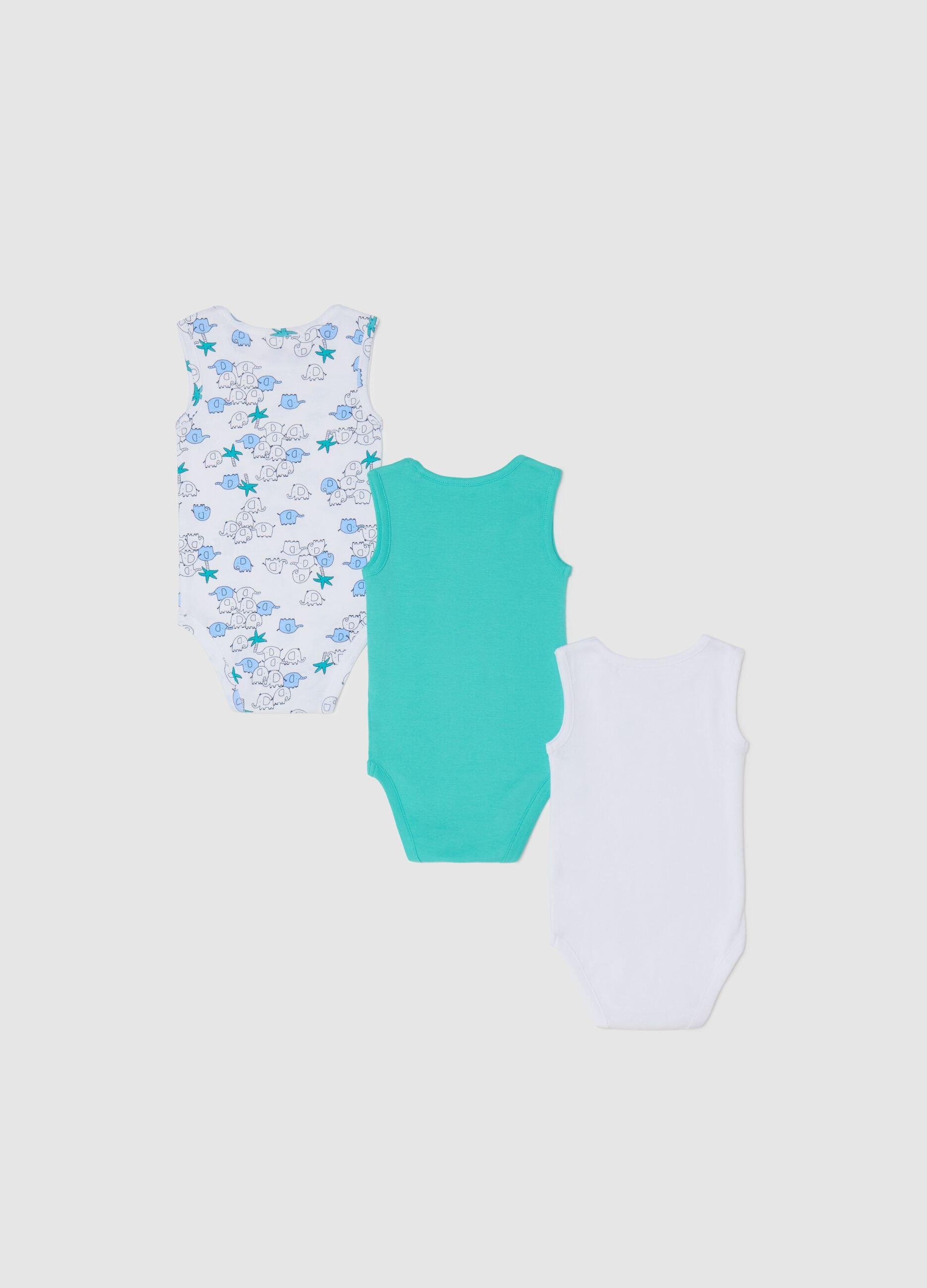 Three-pack white and green sleeveless bodysuits in organic cotton with print