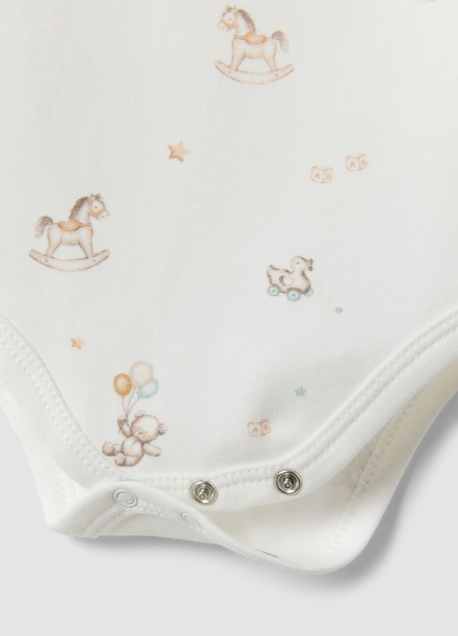 White organic cotton baby bodysuit with collar