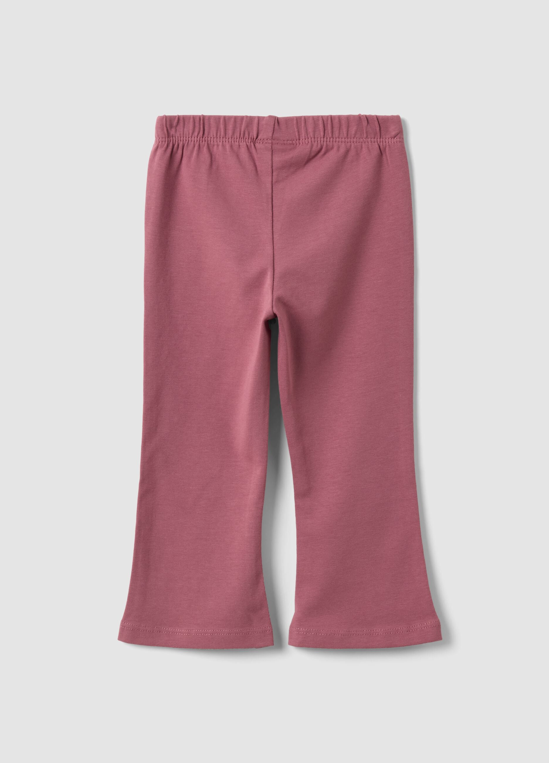 Purple flared leggings in stretchy organic cotton blend with heart print for baby girl