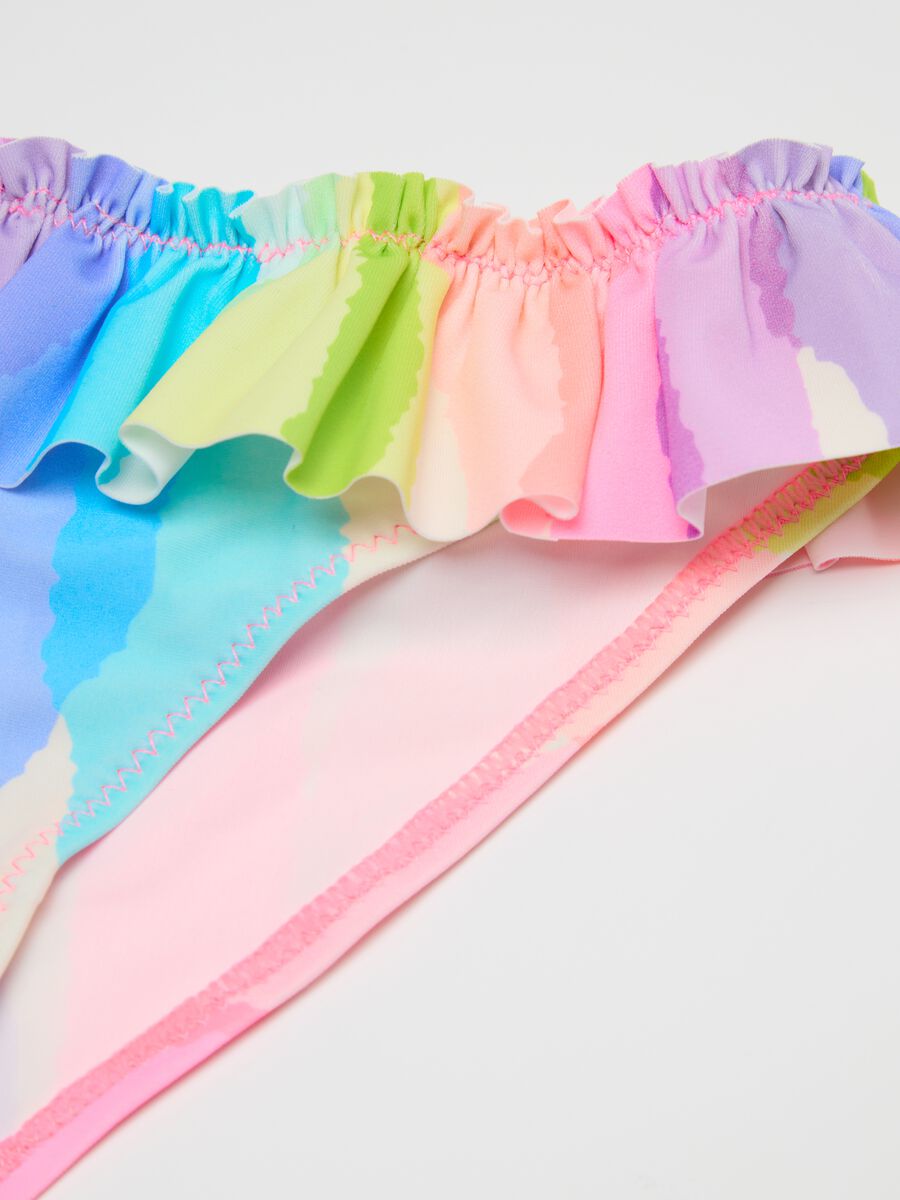 Girls’ swim briefs in multicoloured stretch fabric with frill_3