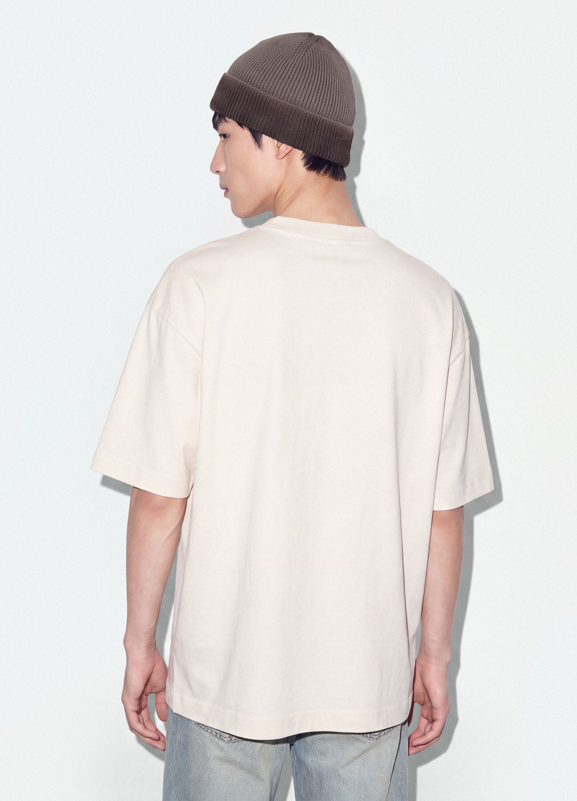 T-shirt bianca in puro cotone con stampa frontale Six Seven boxy fit
