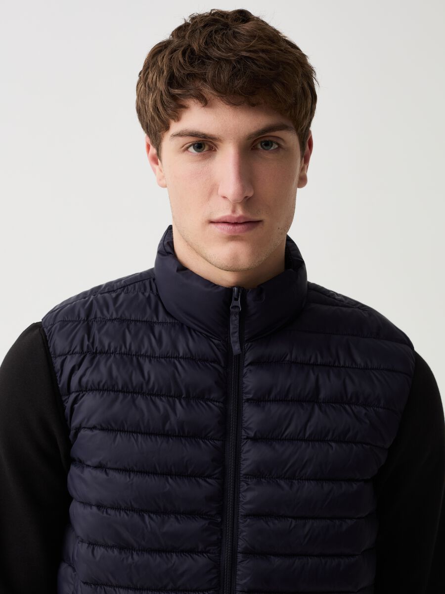 Ultralight quilted gilet with high neck_0