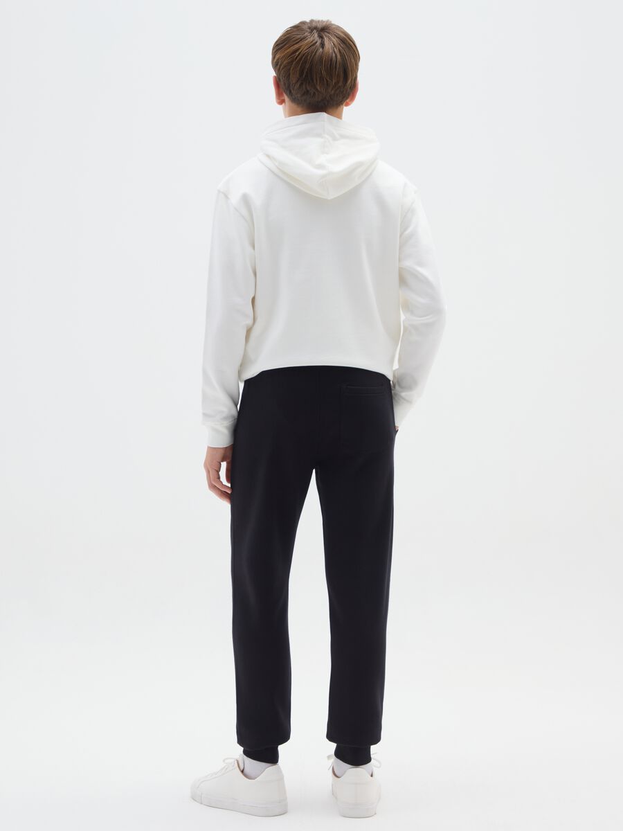 Boys' black joggers in pure cotton regular fit with embroidery_1