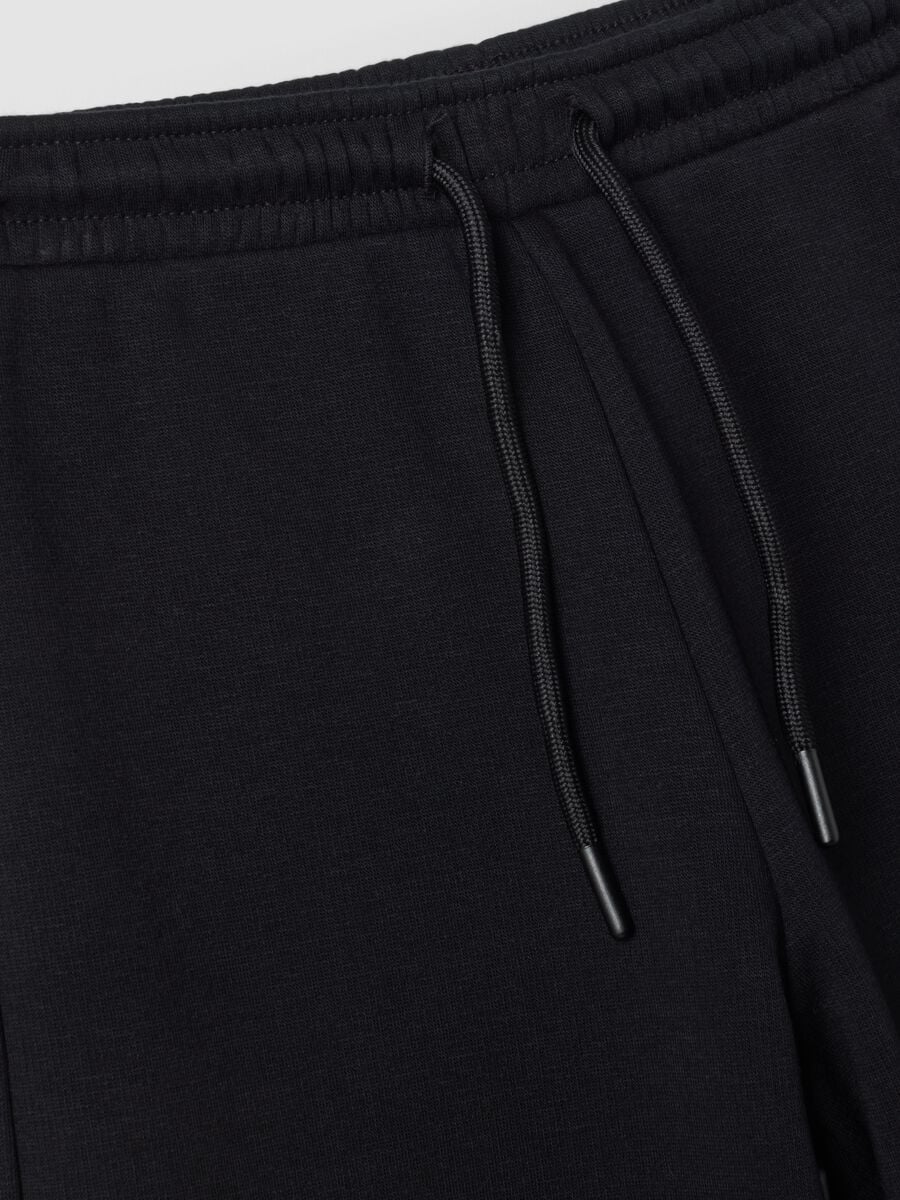 Pantaloni neri wide leg in tessuto fleece elasticizzato_2