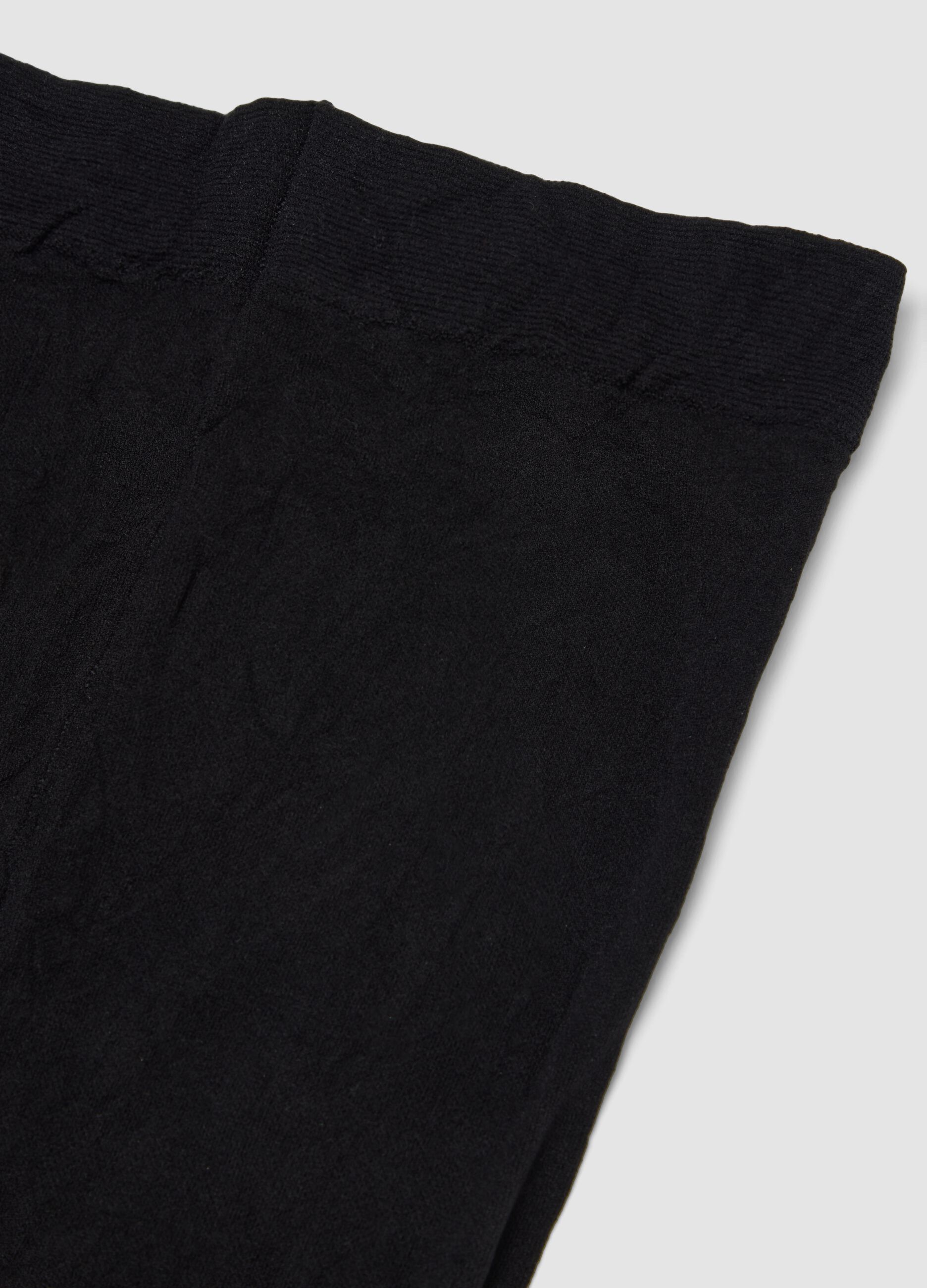 Collant neri in tessuto elasticizzato con filati lurex