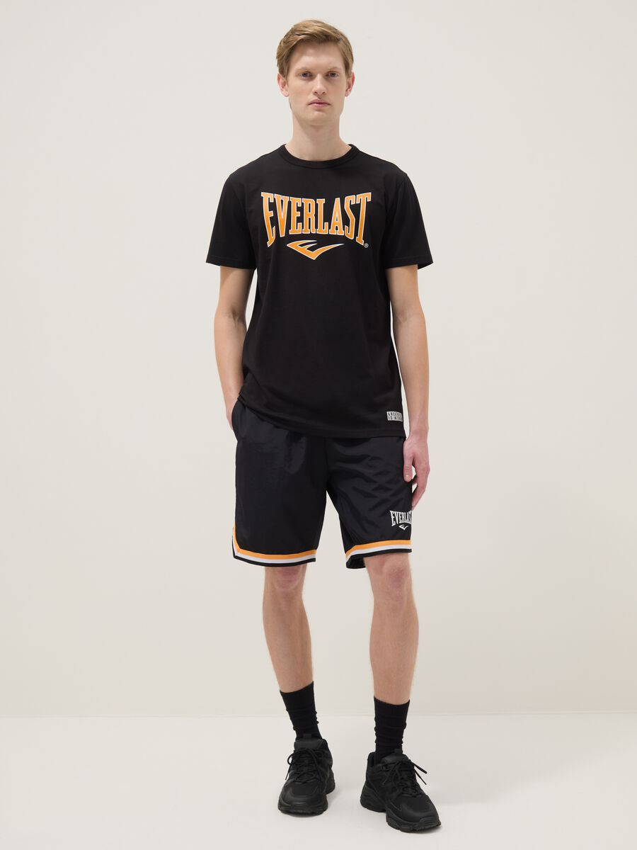 Regular fit black sports shorts with white and orange details_0