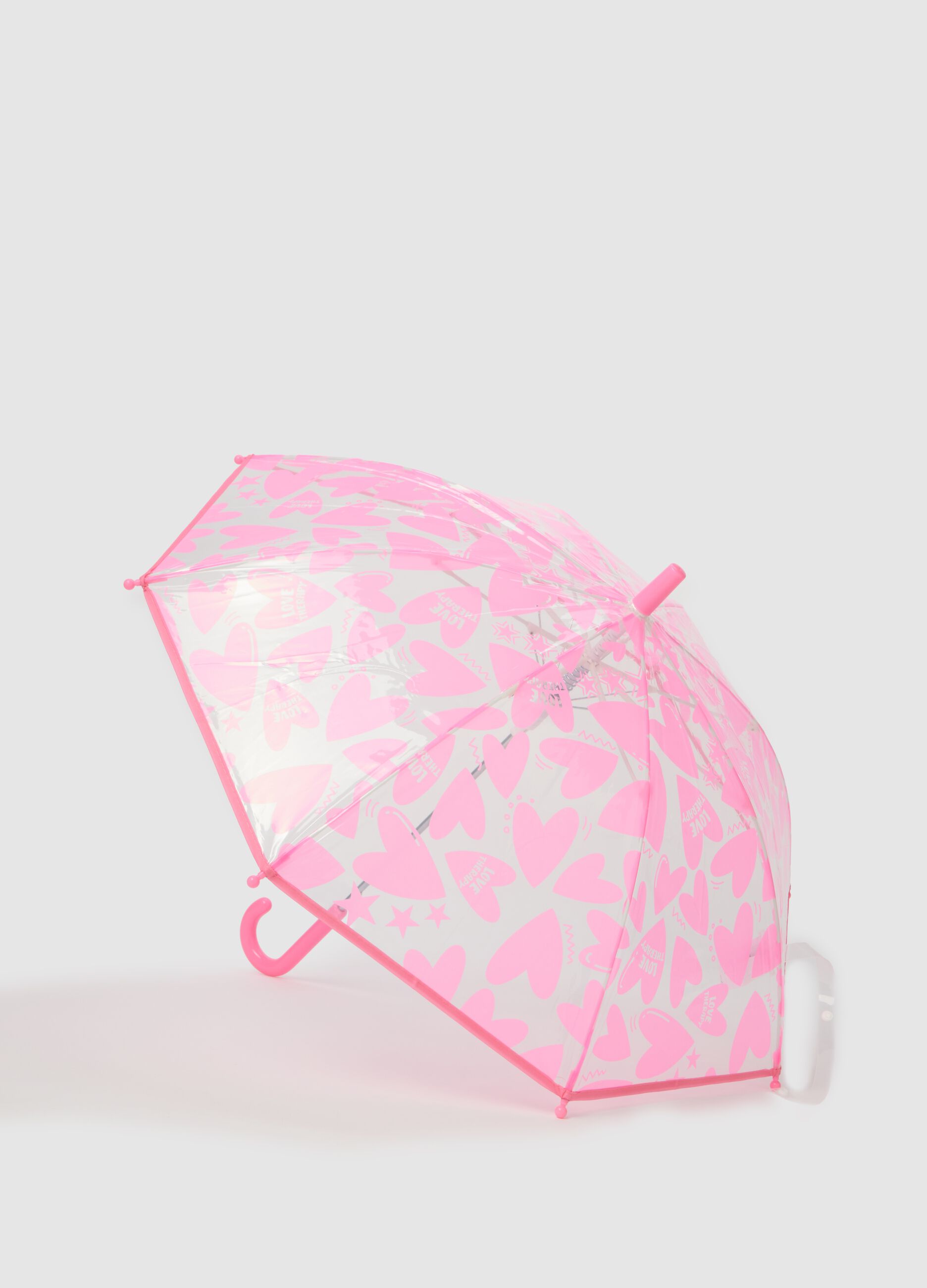Transparent girl's umbrella with pink hearts