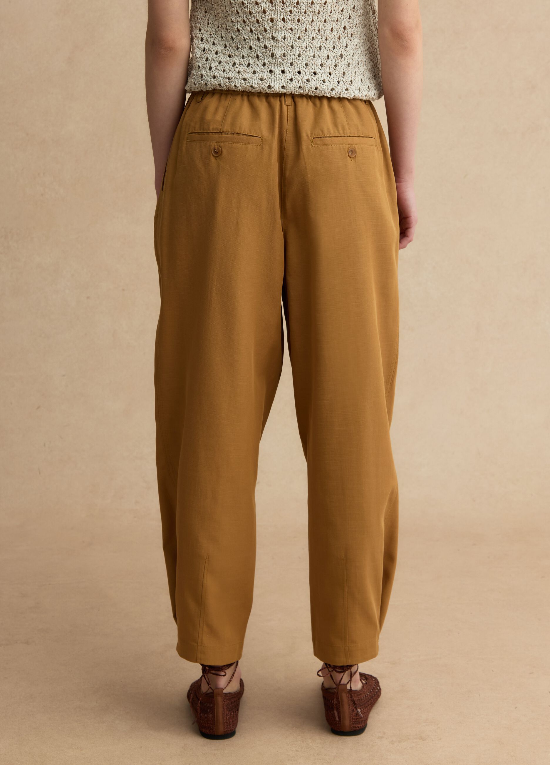 Brown lyocell-cotton blend slouchy fit trousers