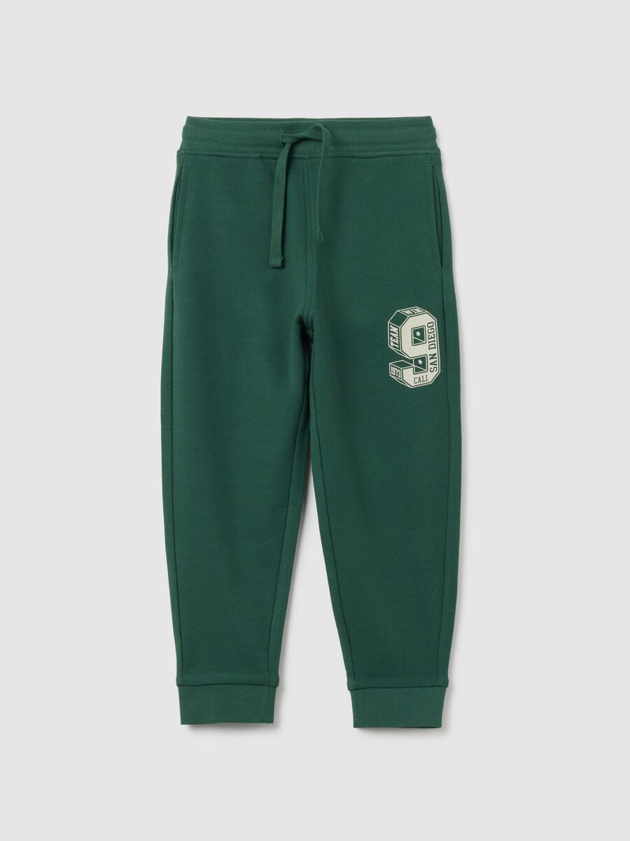 Children's green regular fit jogger trousers in pure cotton_0