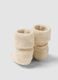 Beige organic cotton knitted baby girl booties_1