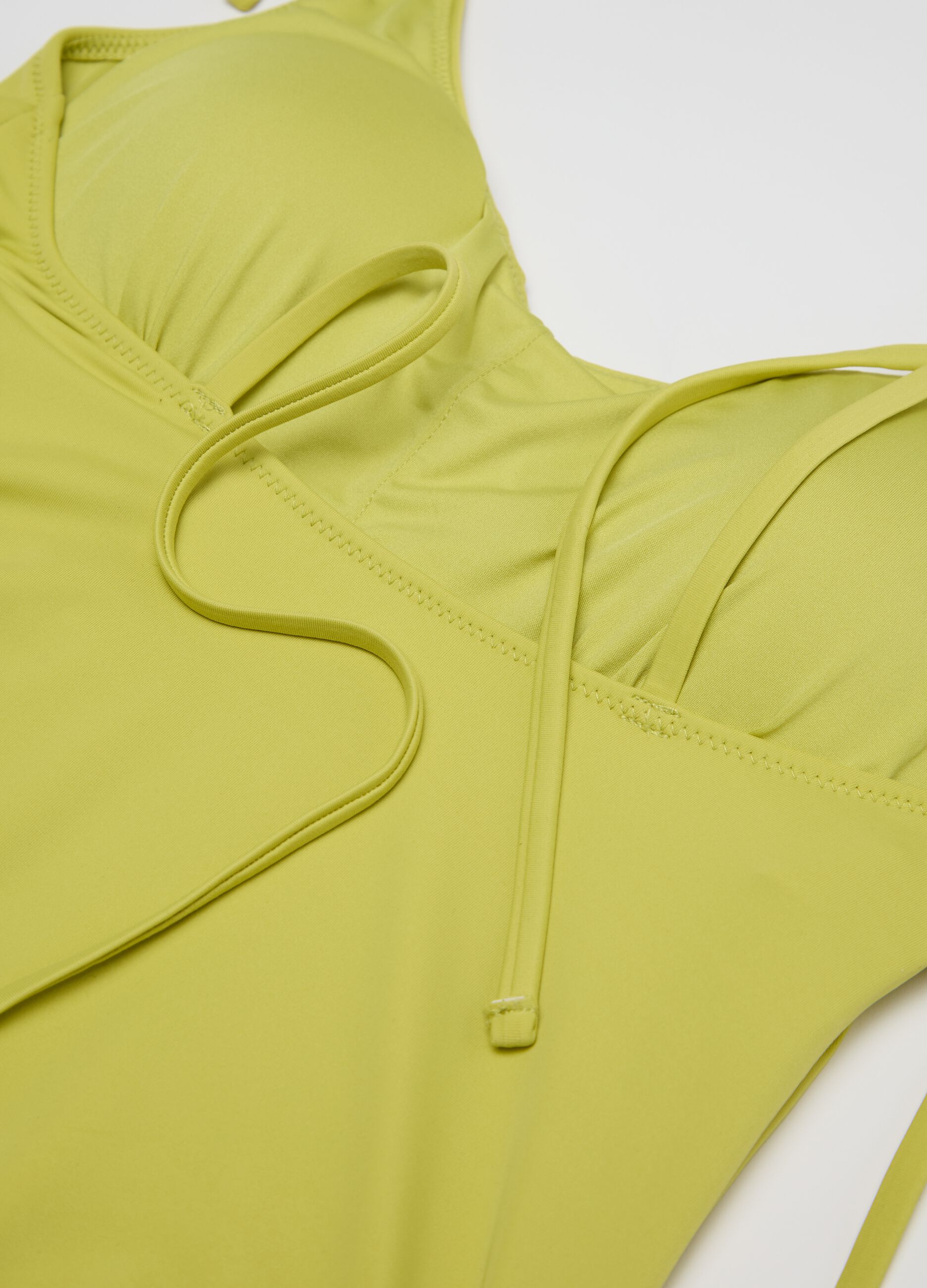 Green one-piece swimsuit