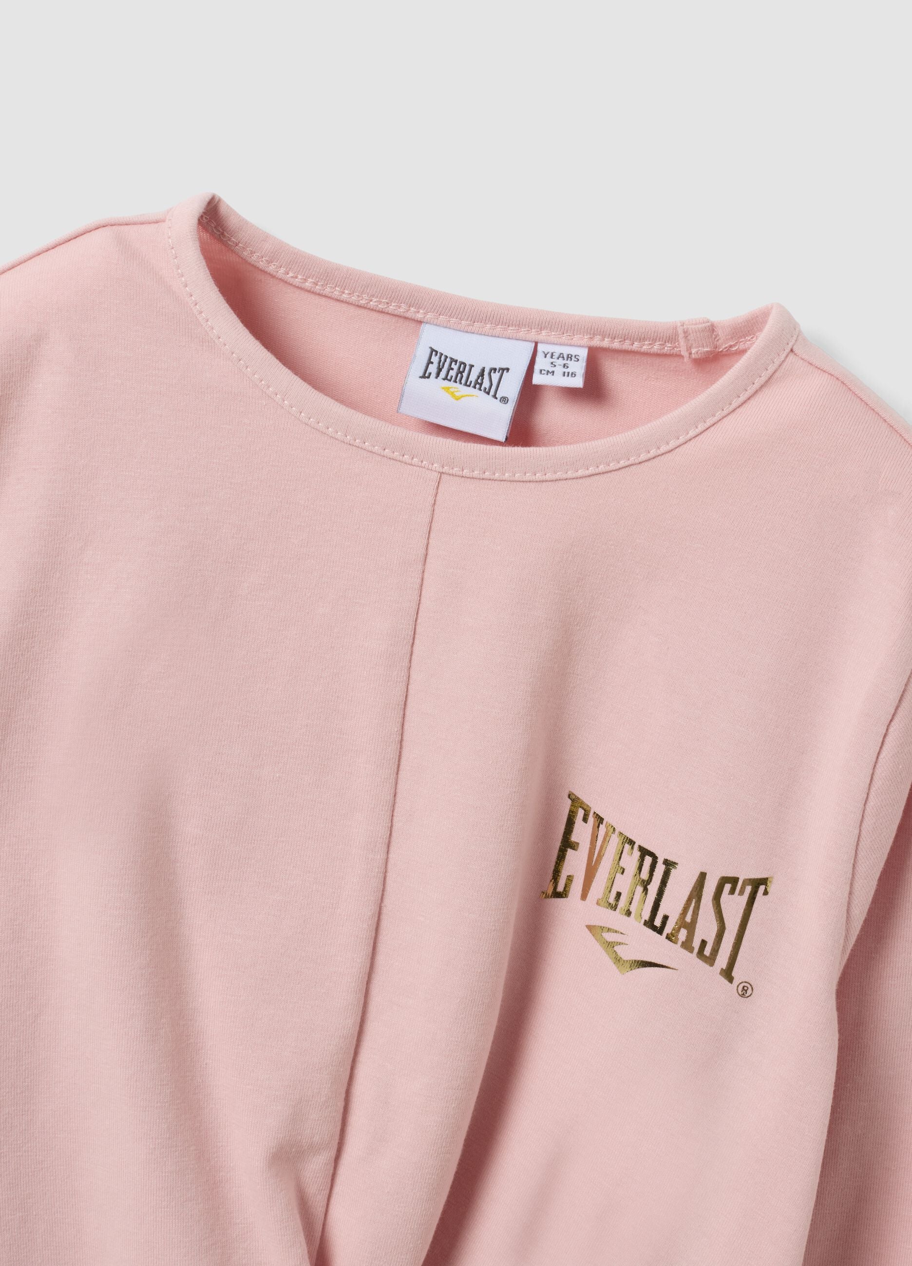 T-shirt rosa in cotone elasticizzato con nodo frontale e stampa per bambina