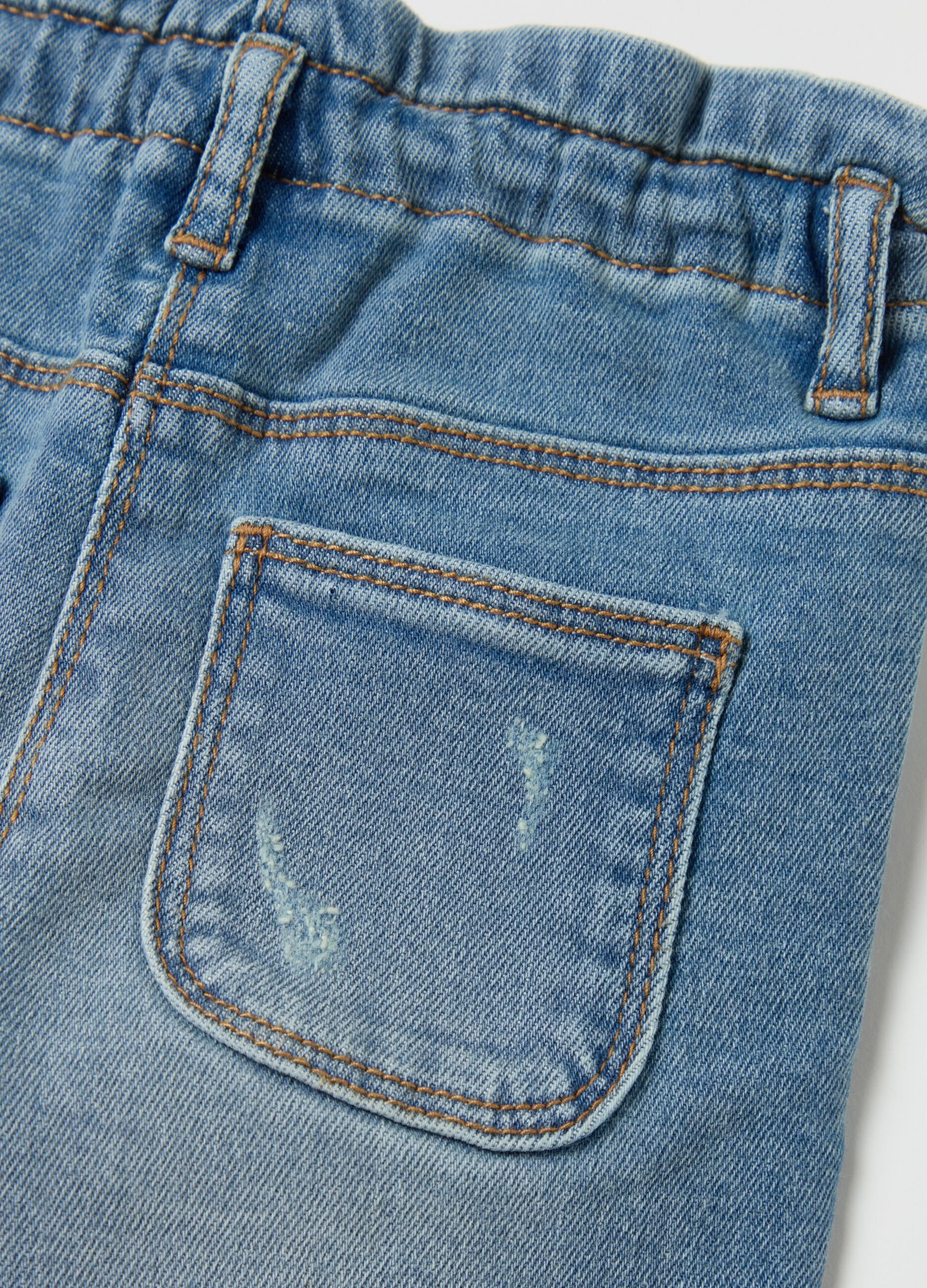 Baggy-fit jeans with five pockets and abrasions
