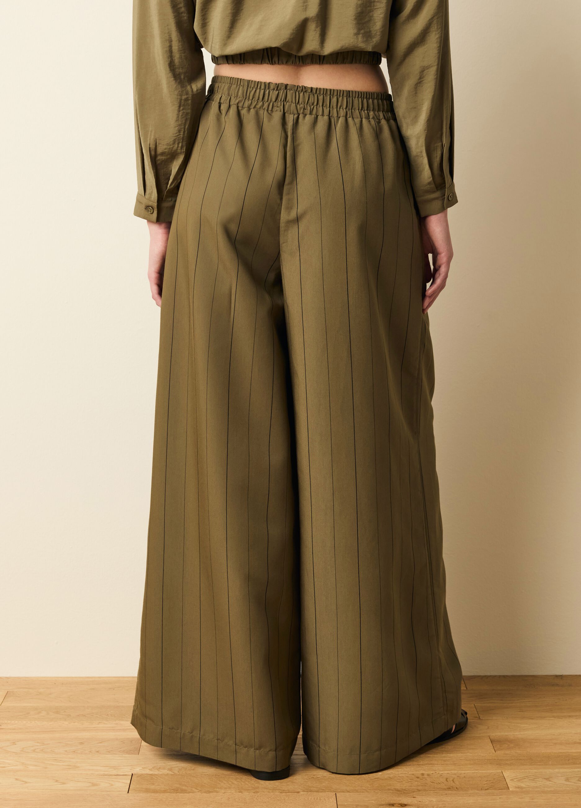 Wide-leg pinstriped trousers with darts