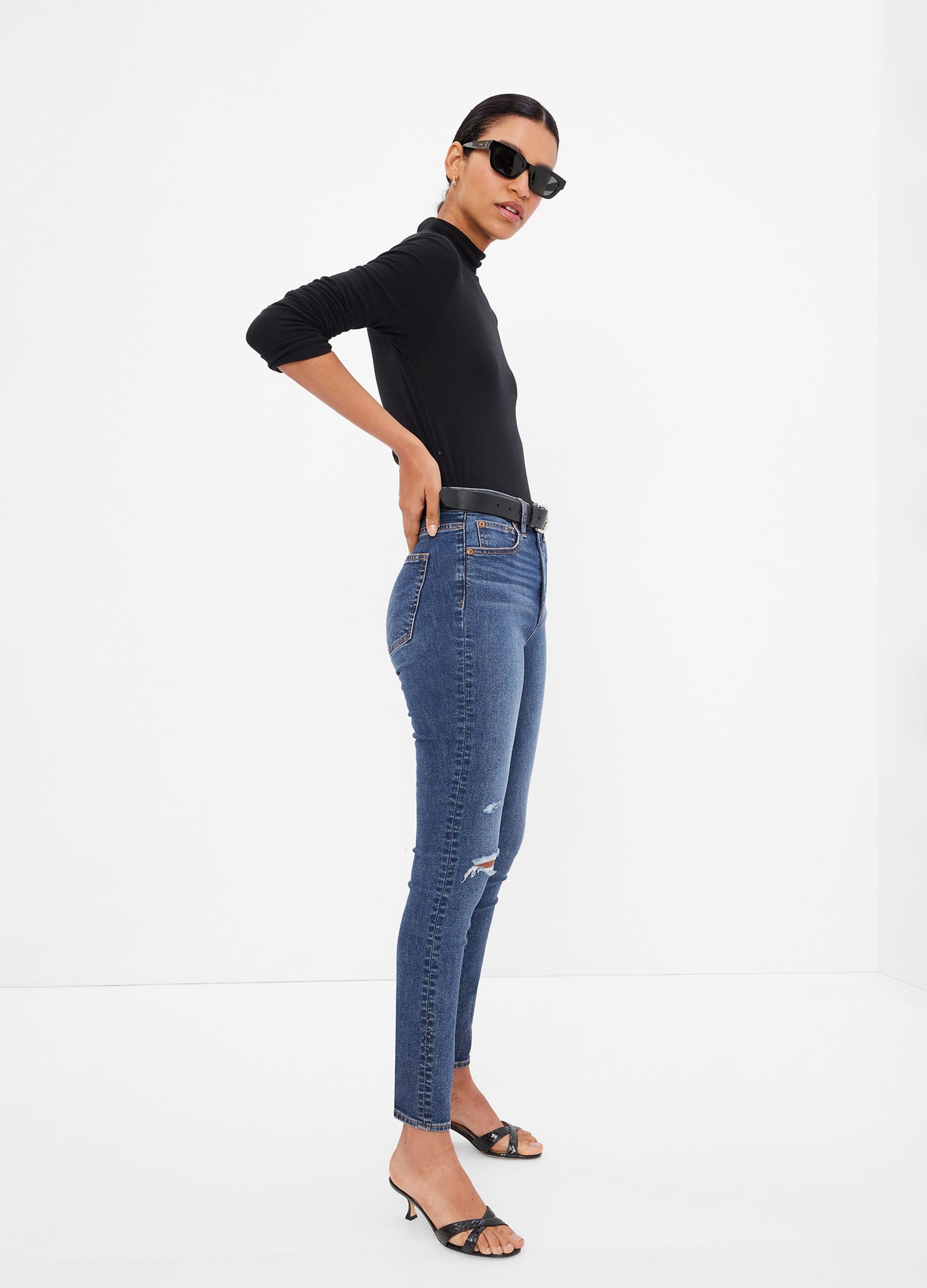 High-waisted skinny-fit jeans with worn look