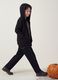 Jogger nero in misto cotone e viscosa con vita elasticizzata per bambino_0