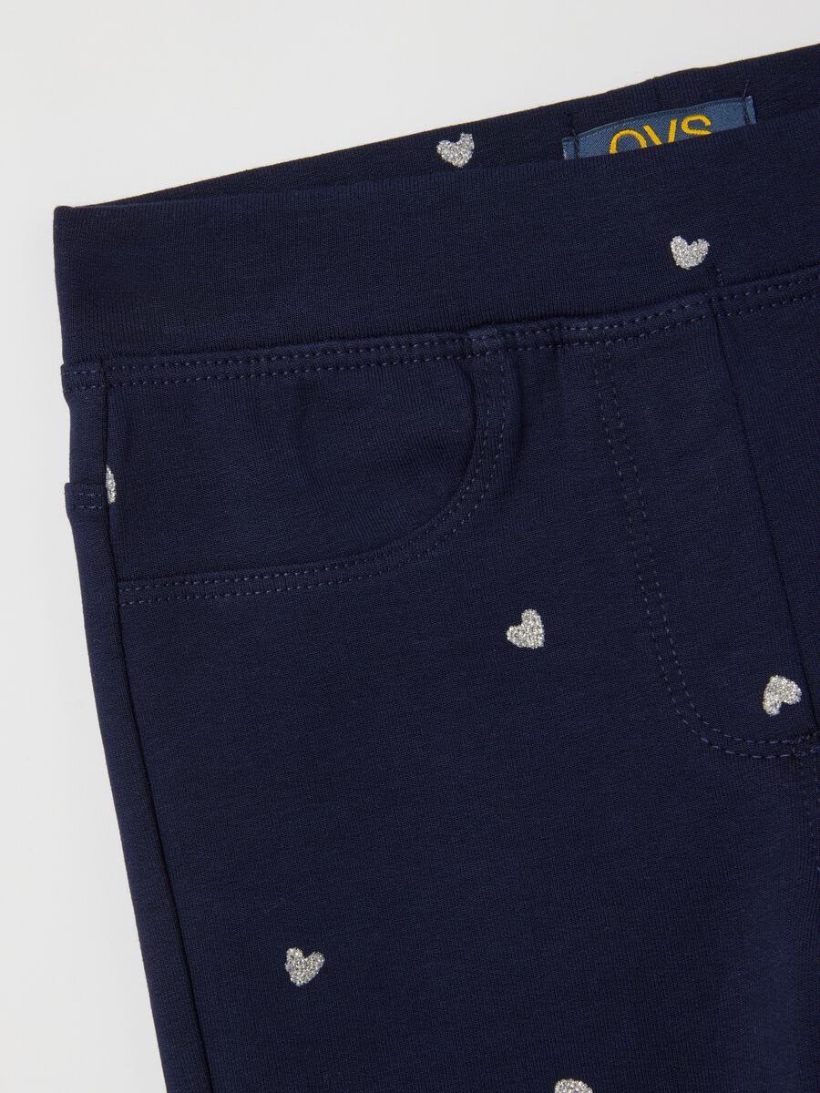 Girls' blue cotton flare trousers with hearts_2