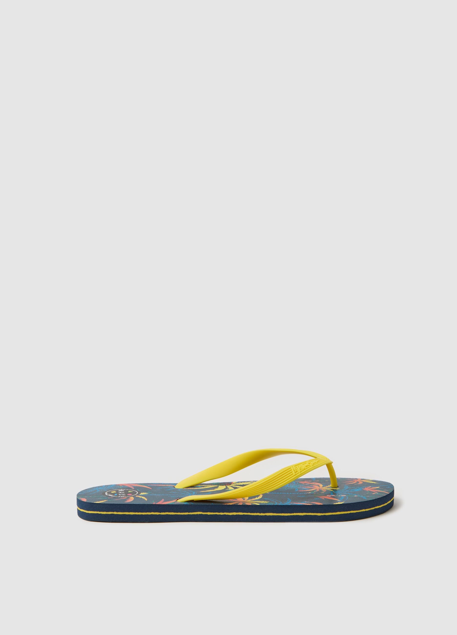 Maui and Sons blue flip flops with tropical print