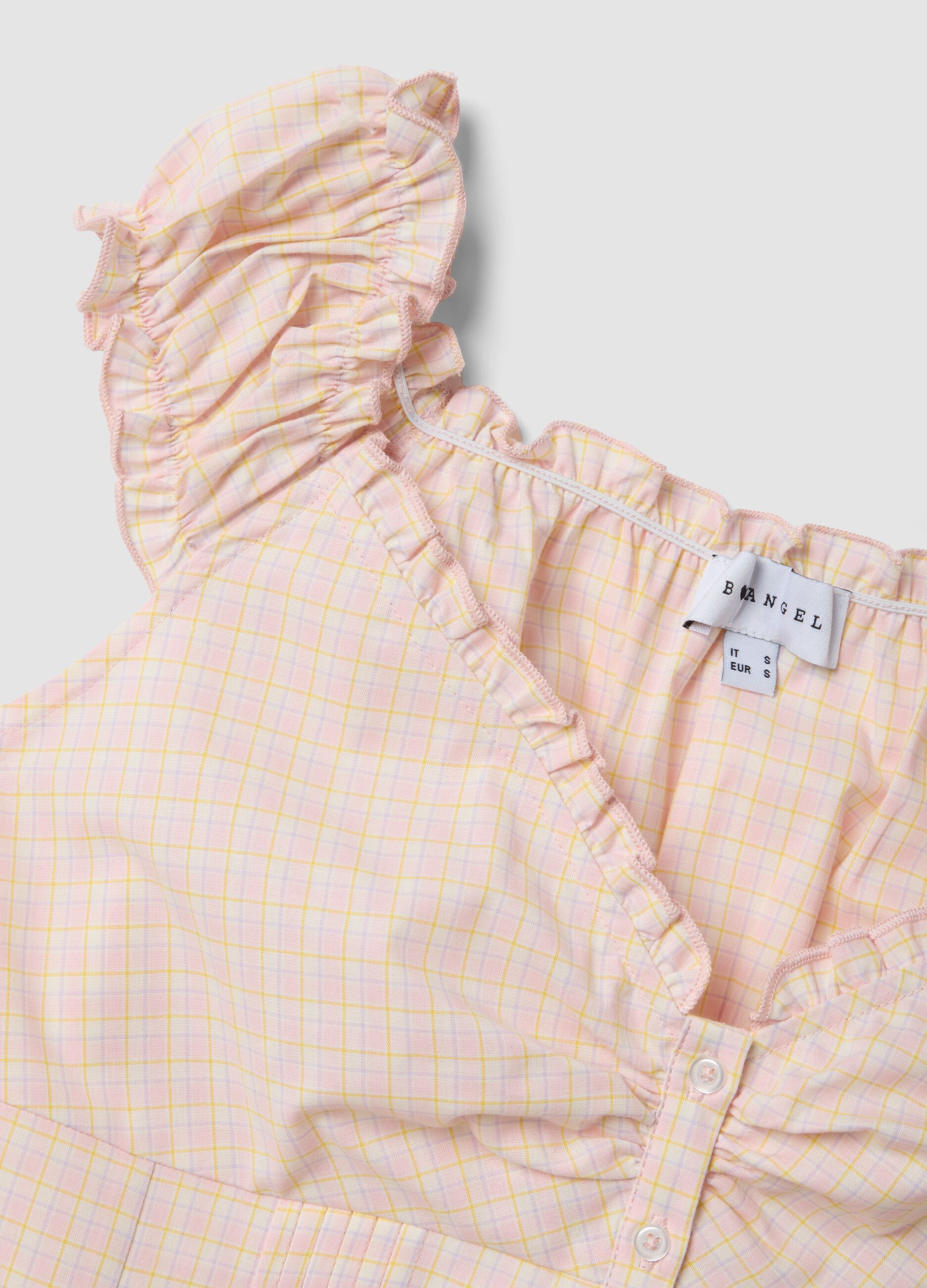 Pink organic cotton blouse with buttons and ruffles