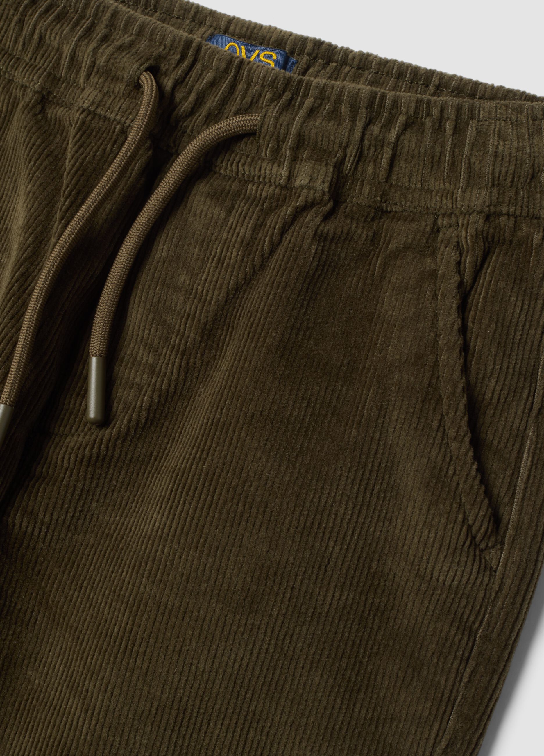 Pantaloni verdi in cotone elasticizzato a coste