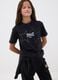 T-shirt nera cropped in puro cotone con stelle applicate per ragazza_0