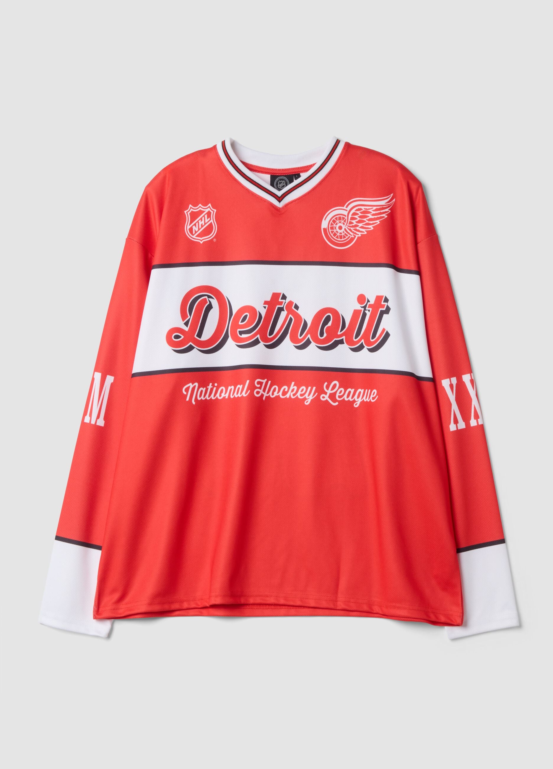 Red and white hockey-style T-shirt with Detroit Red Wings print