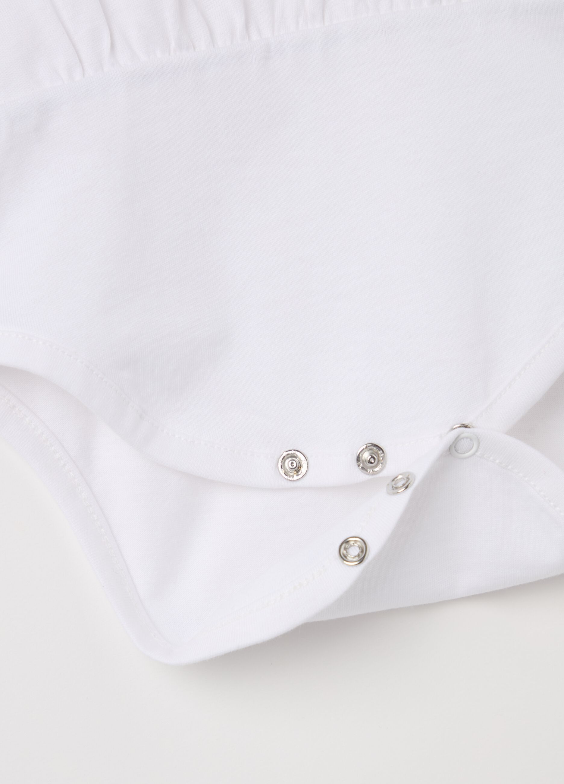 Cotton bodysuit with collar in broderie anglaise