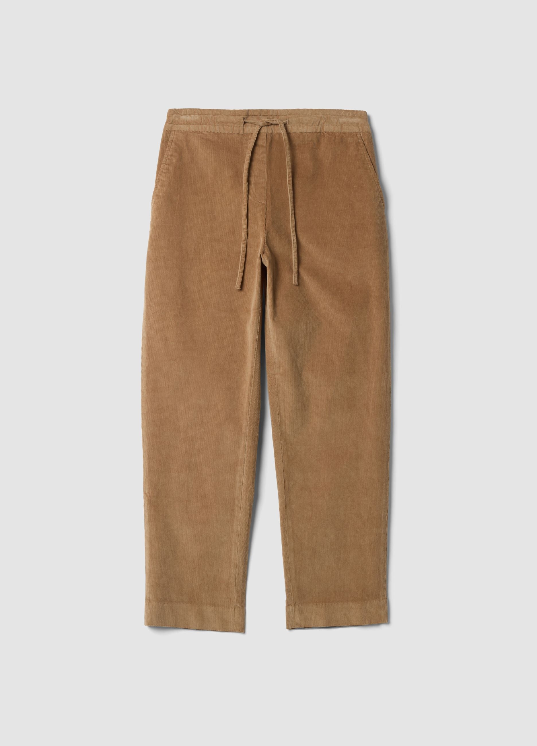 Beige ribbed stretch cotton trousers with elasticated waistband