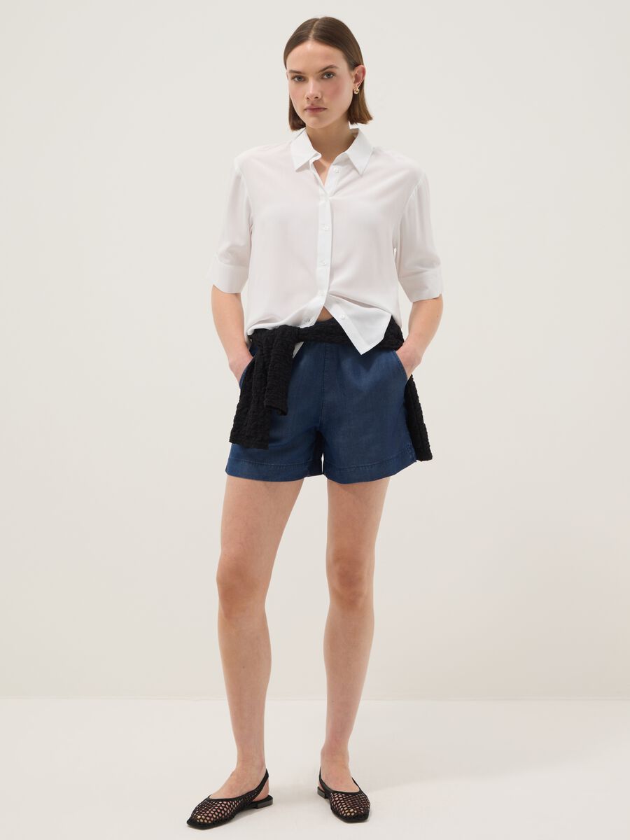 Shorts in denim blu in puro lyocell con vita elasticizzata regular fit_0